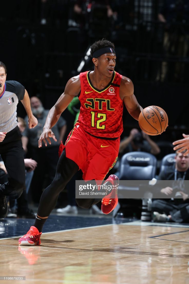 736x1104 De'Andre Hunter of the Atlanta Hawks handles the ball against the