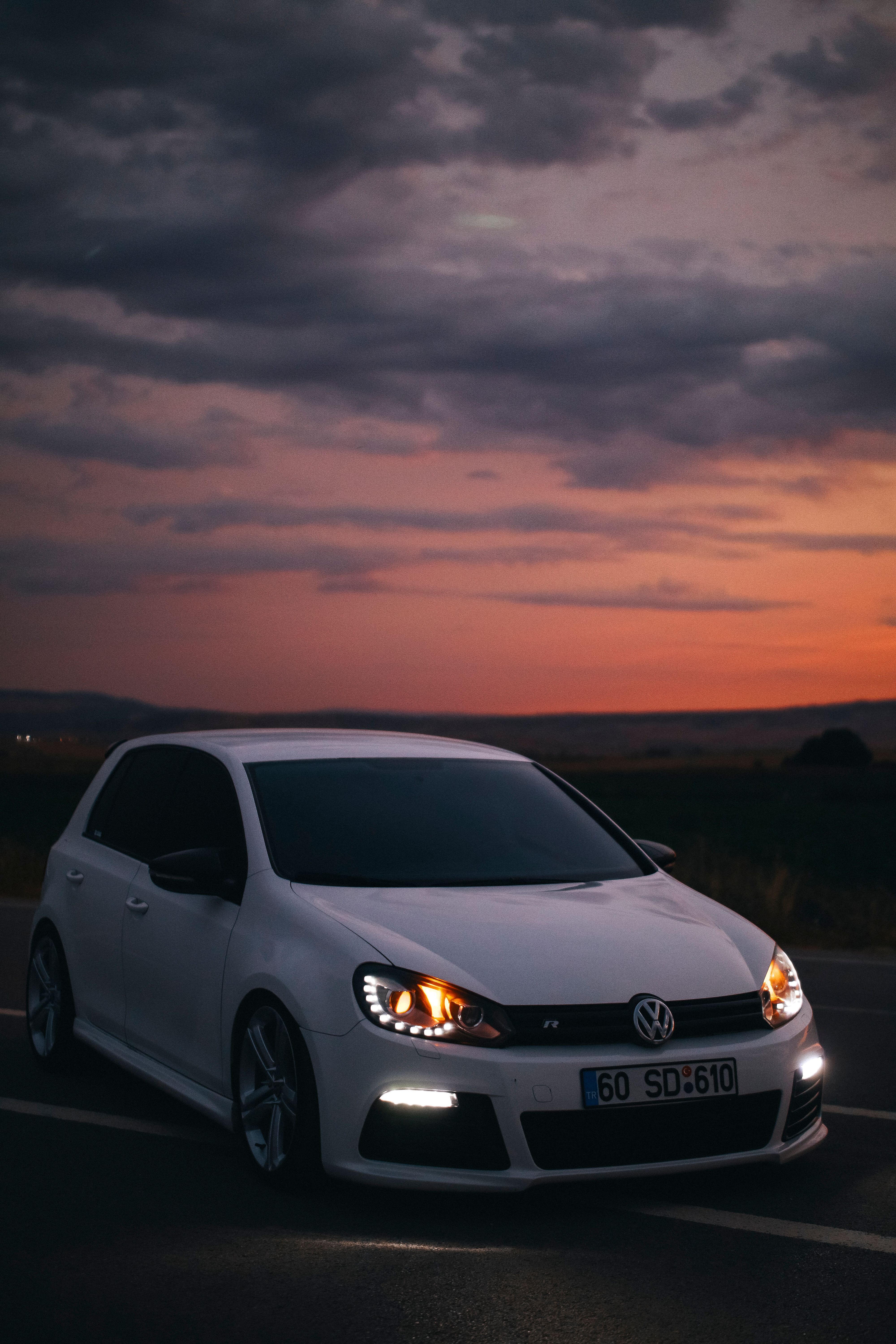 4000x6000 White Volkswagen Golf VI at Sunset · Free