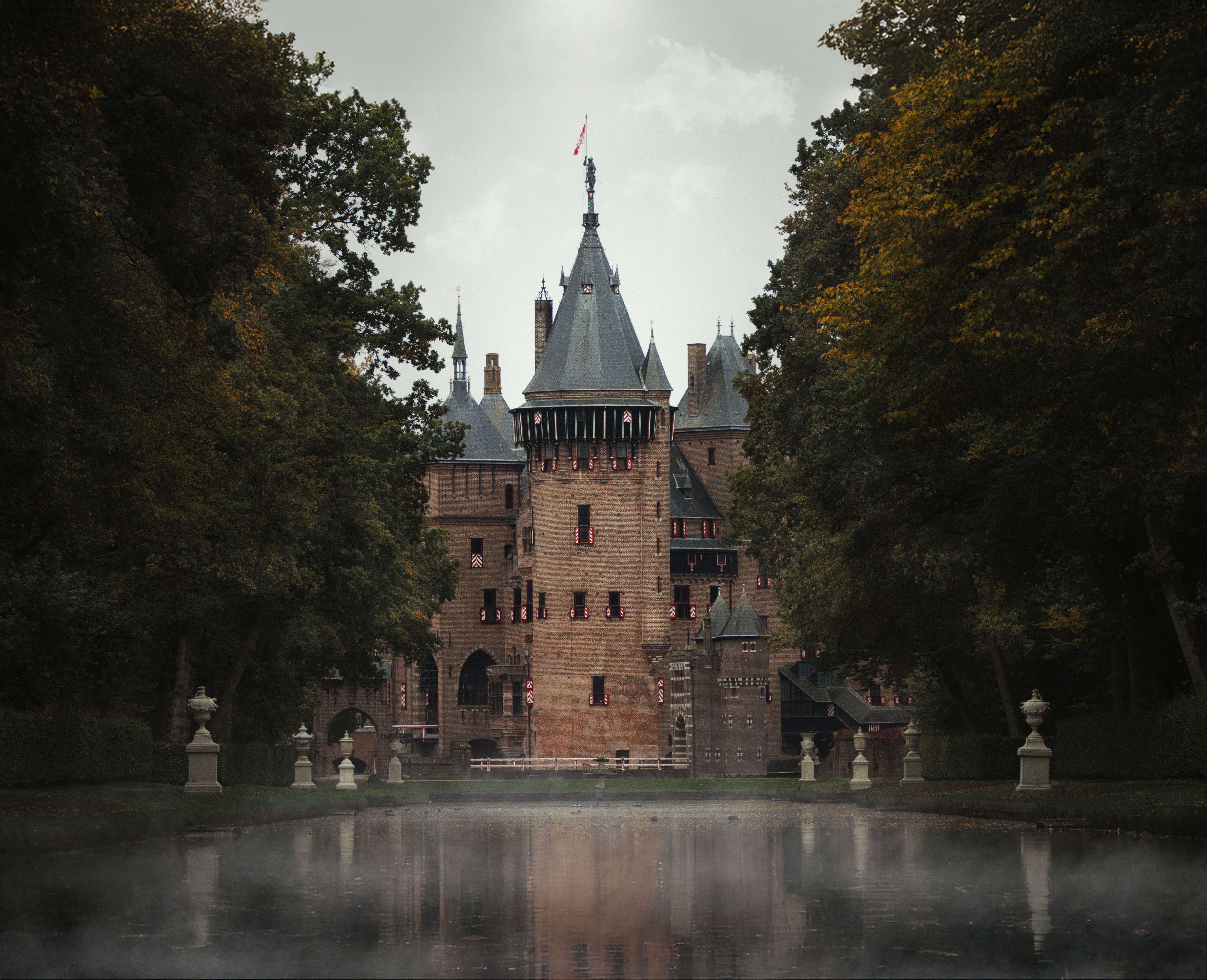 6272x5092 Gothic Castle with Reflective Moat and Autumn Trees · Free