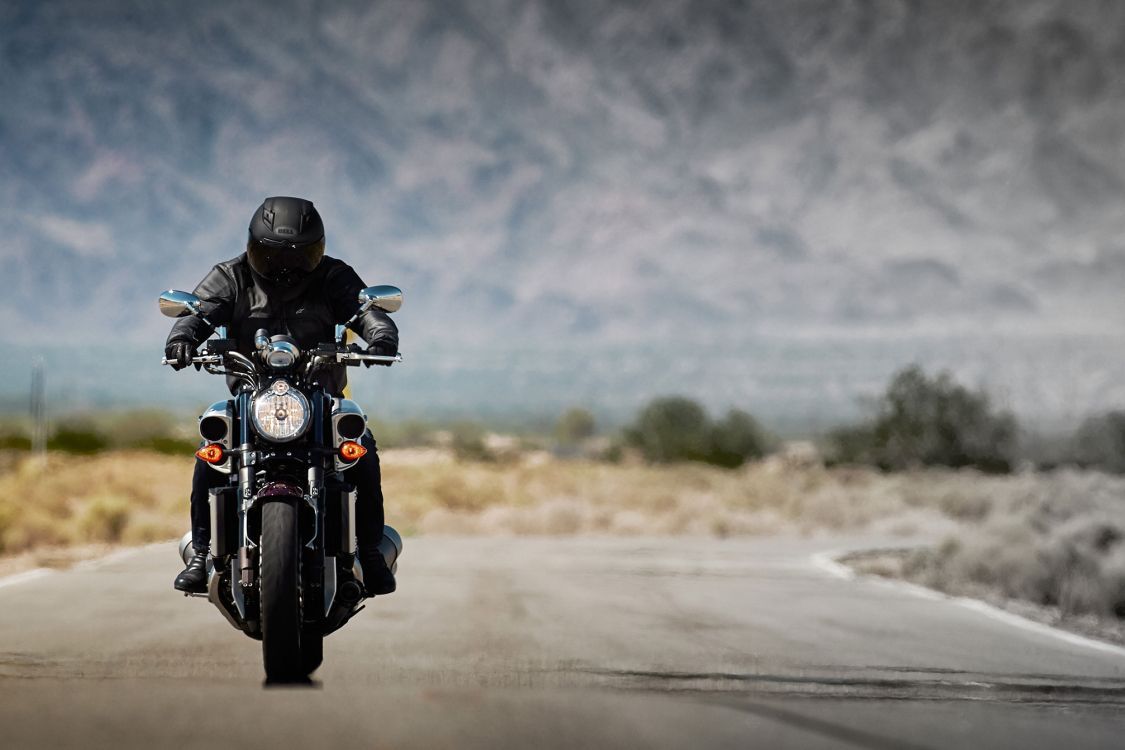 1125x750 Wallpaper Man in Black Motorcycle Helmet Riding Motorcycle on Road During Daytime, Background Free Image