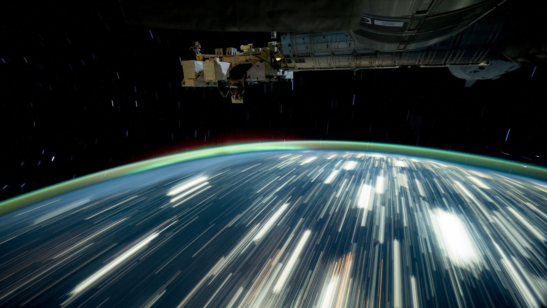 1920x1080 NASA astronaut captures city lights streaking below ISS in stunning new photo
