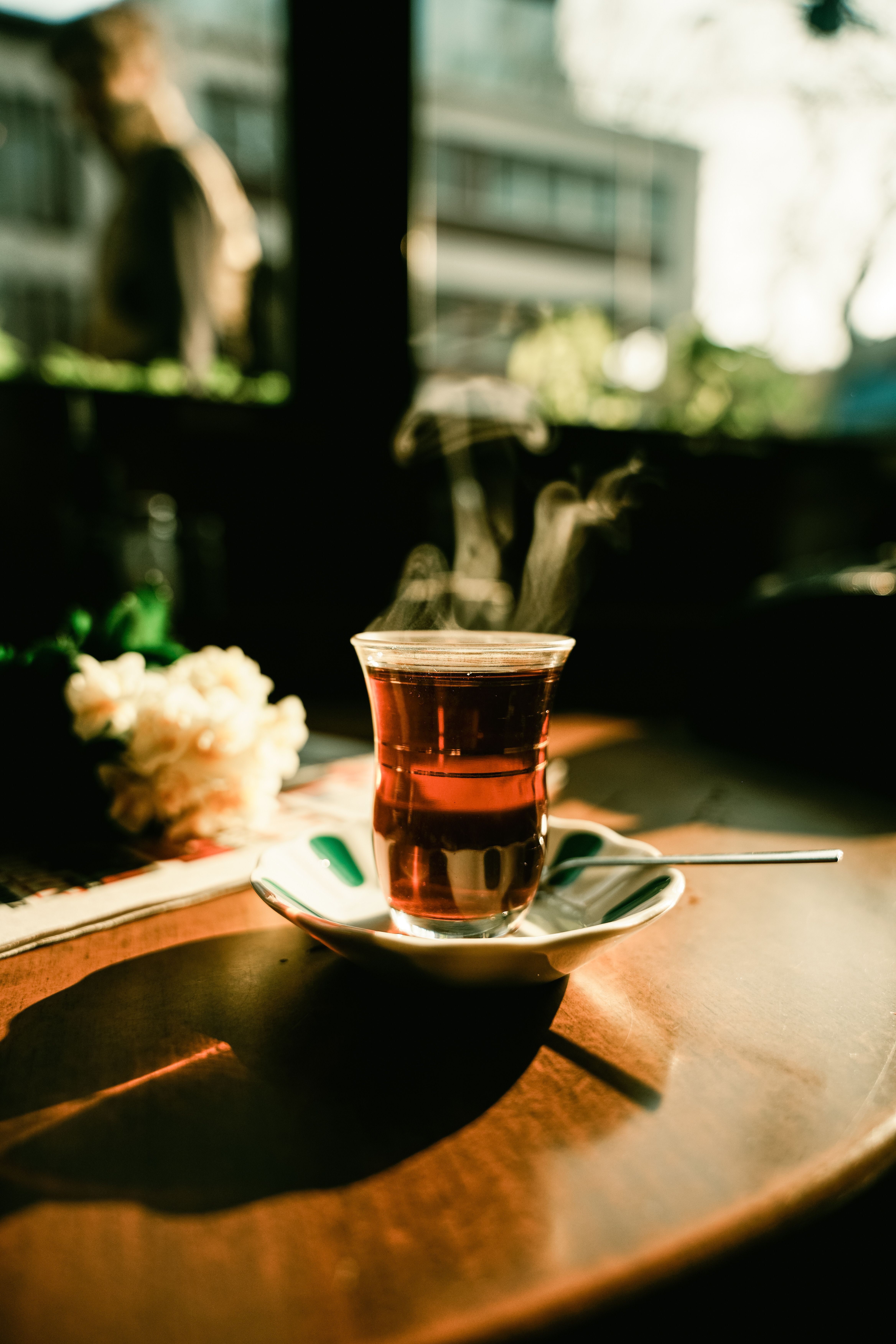 4672x7008 Steaming Cup of Tea on Sunlit Table · Free