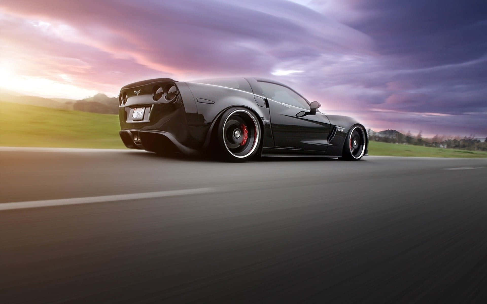 1920x1200 Download Stunning Chevrolet Corvette Z06 in Action Wallpaper