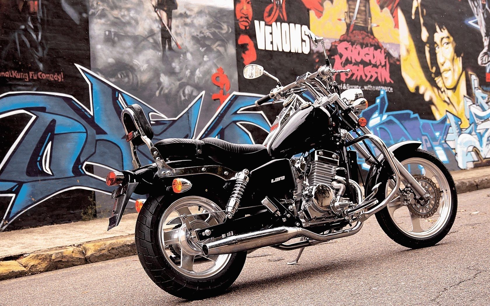 1680x1050 HD Motorcycle Beauty Against Urban Graffiti Backdropx1050