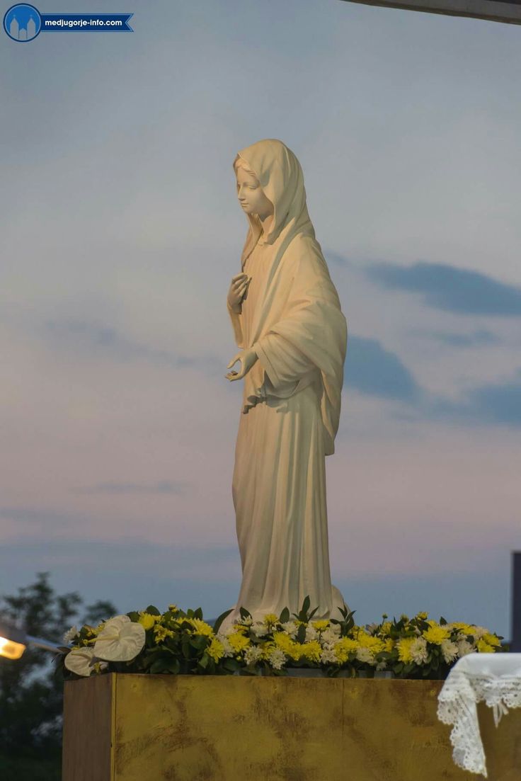 736x1103 Statue of the Virgin Mary with Flowers. Kreupasanam mother mary wallpaper, Medjugorje aesthetic, Marian statue