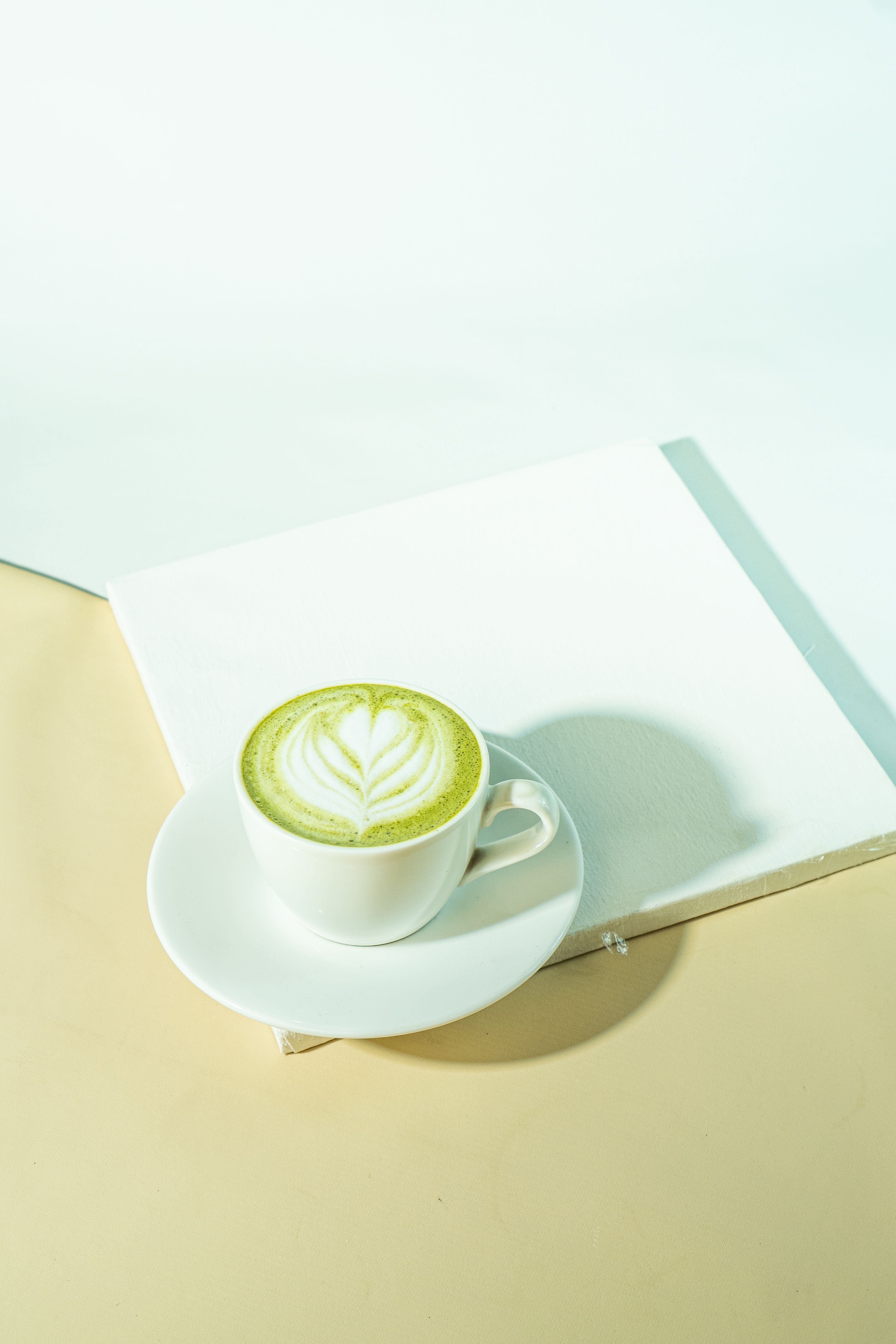 3572x5358 Minimalist Matcha Latte on Canvas Background · Free