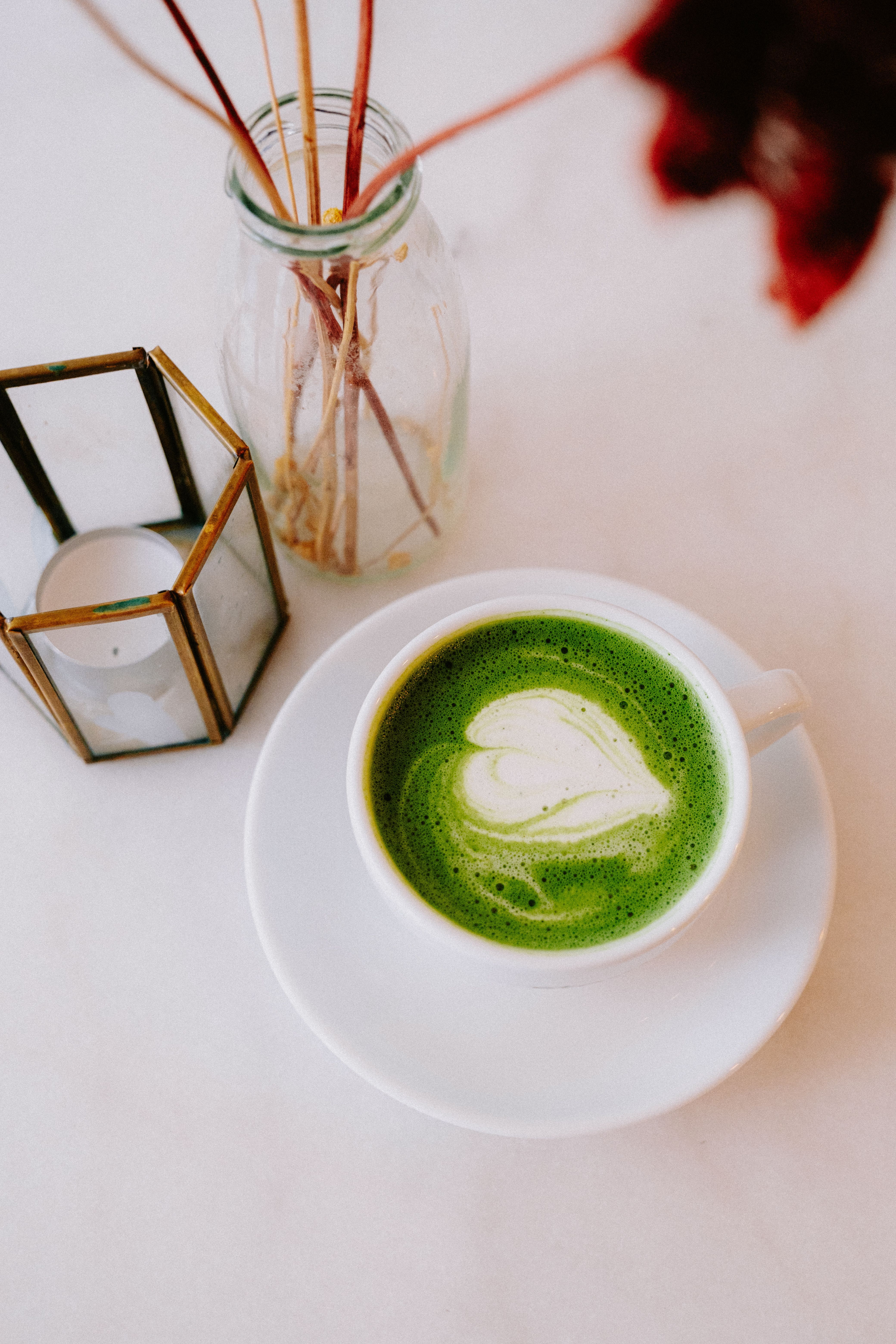 4160x6240 Autumn Matcha Latte with Foam Art on Wooden Table · Free