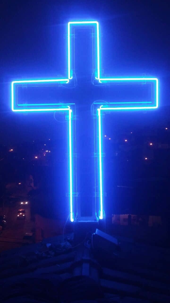720x1280 Download A Cross Shining with Blue Light Wallpaper
