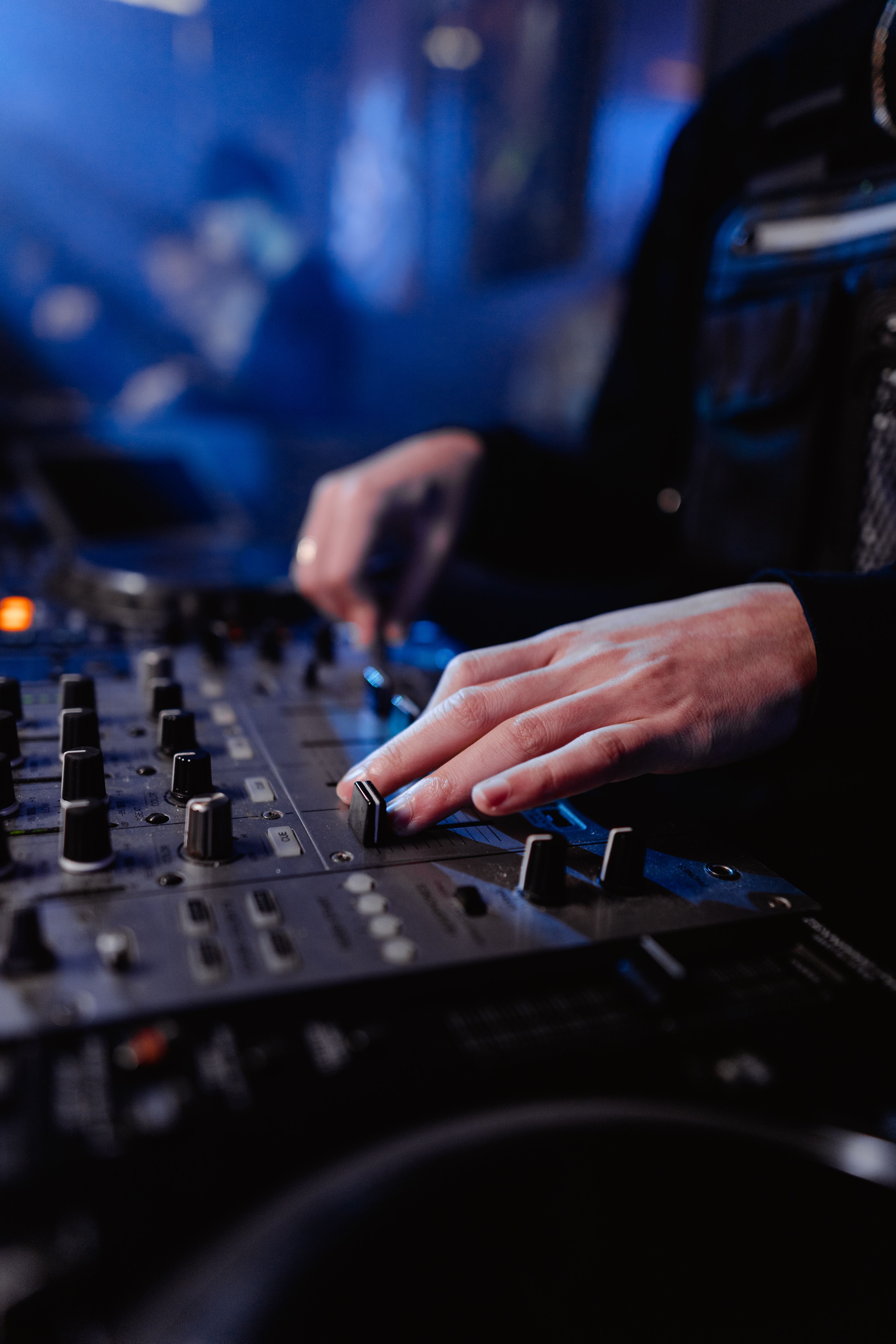 4000x6000 A Person Using Black Audio Mixer · Free