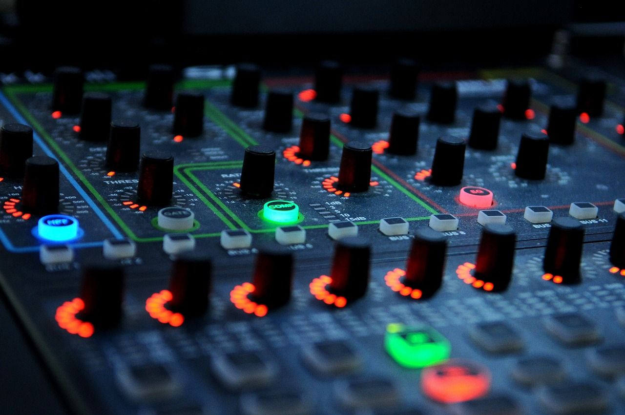 1280x850 Illuminated Audio Mixing Console Close Up Photo