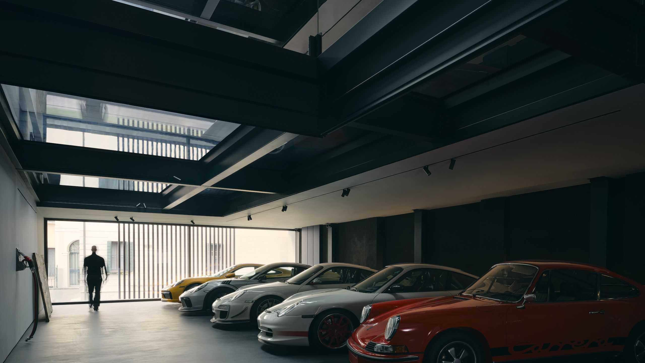 2560x1440 A Porsche collector's private garage is a cabinet for cars. Wallpaper*