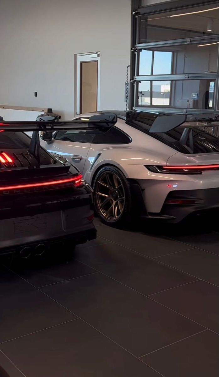 697x1200 Luxury Sports Cars. Two cars parked in a garage, Porsche aesthetic wallpaper iphone, White sports cars in a garage