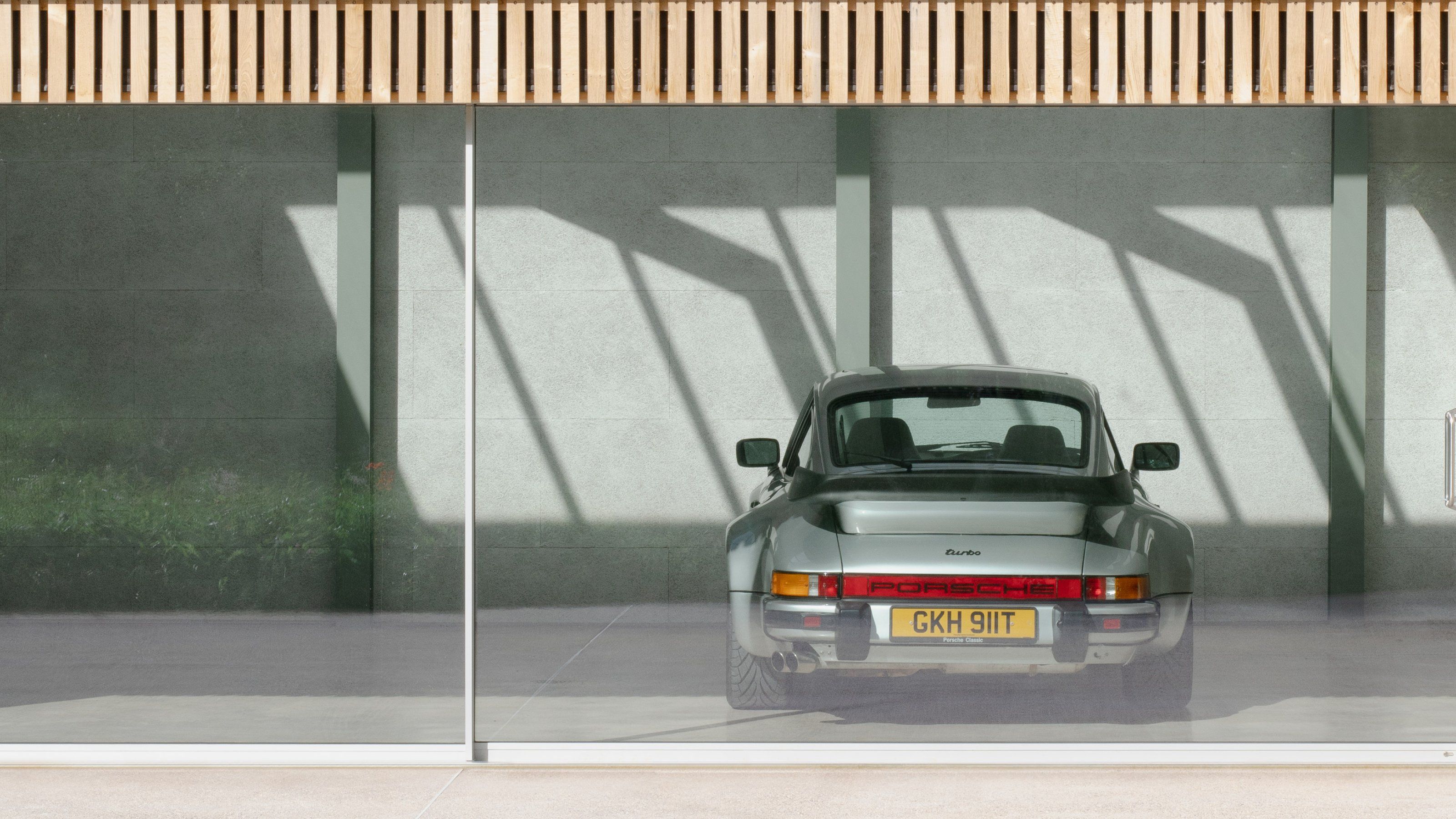 3200x1800 Autobarn is the home for a collection of Porsches. Wallpaper*