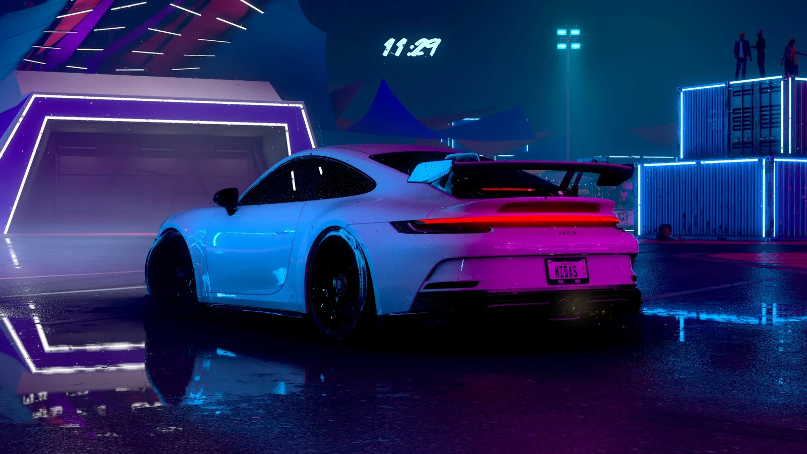 1600x900 Porsche 992 GT3 at a Neon Garage Wallpaper