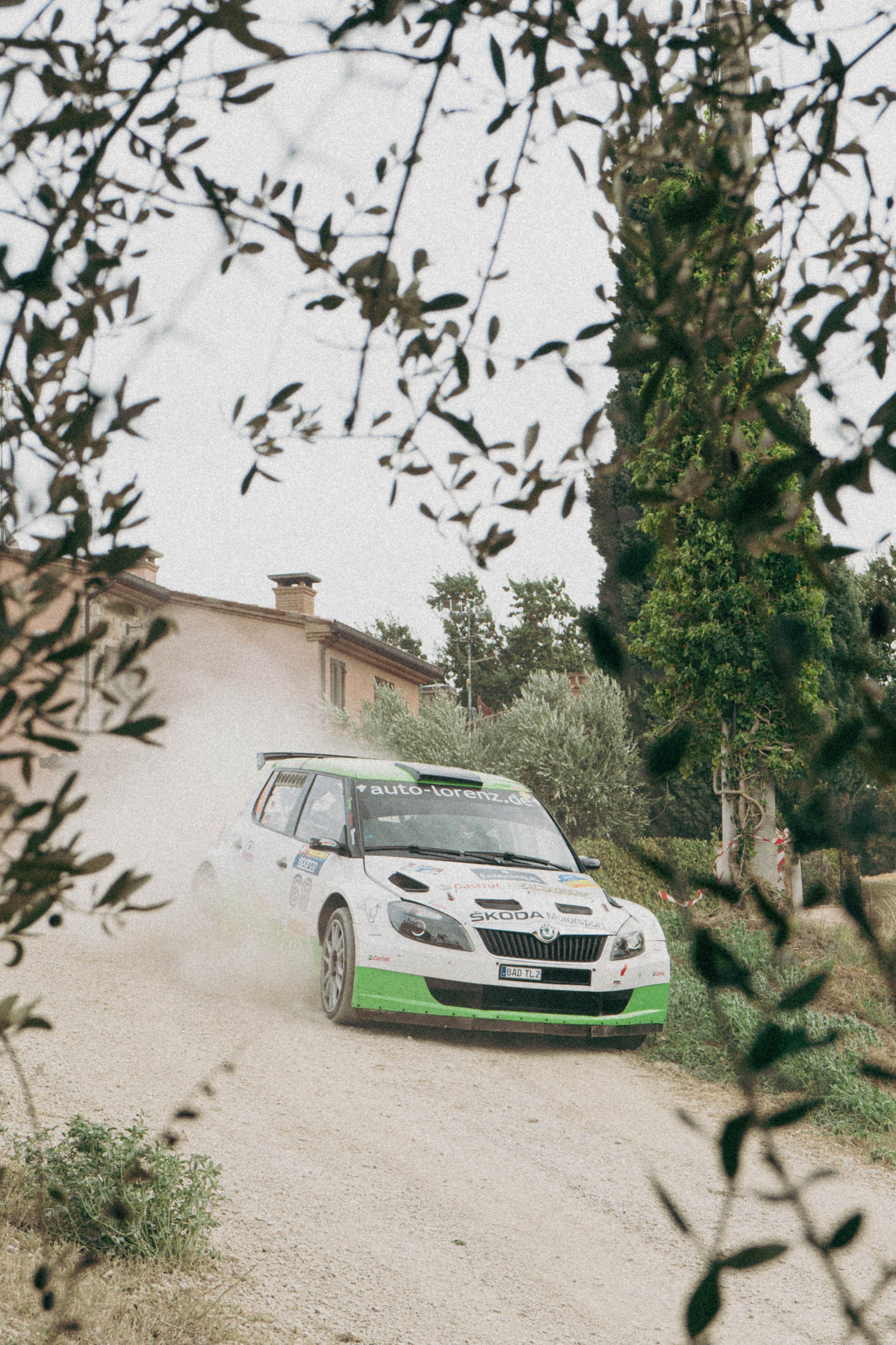 3026x4539 Rally Skoda Fabia on Dirt Road · Free