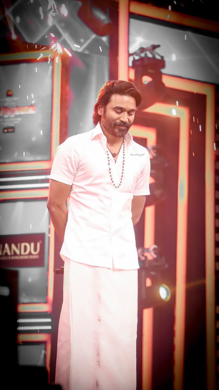736x1308 Dhanushkraja wallpaper