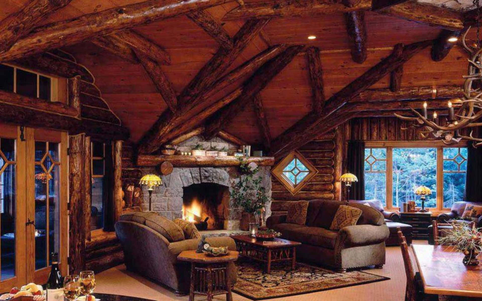 1920x1200 Download a log cabin with a fireplace Wallpaper
