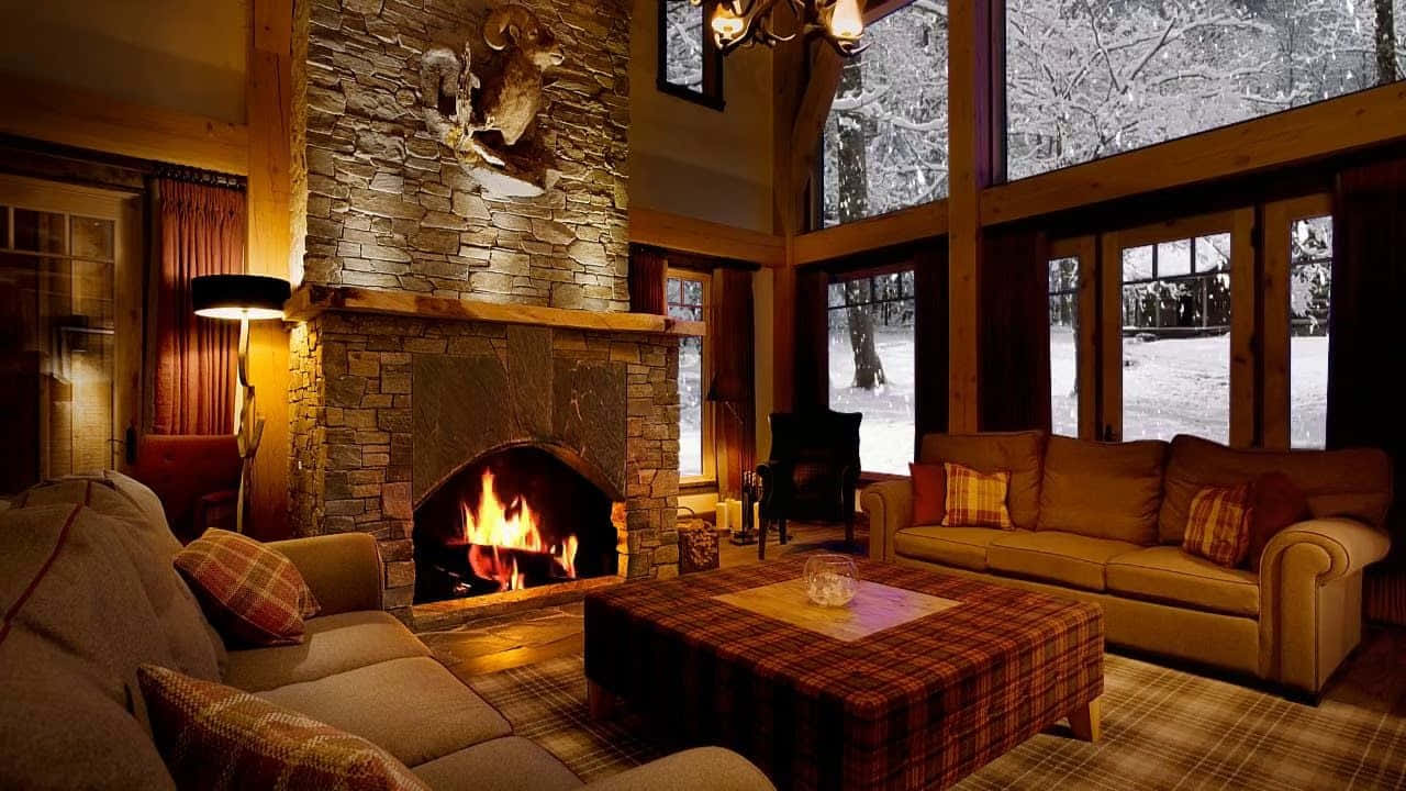 1280x720 Download Warm and Inviting Cozy Winter Cabin Nestled in the Snow Wallpaper