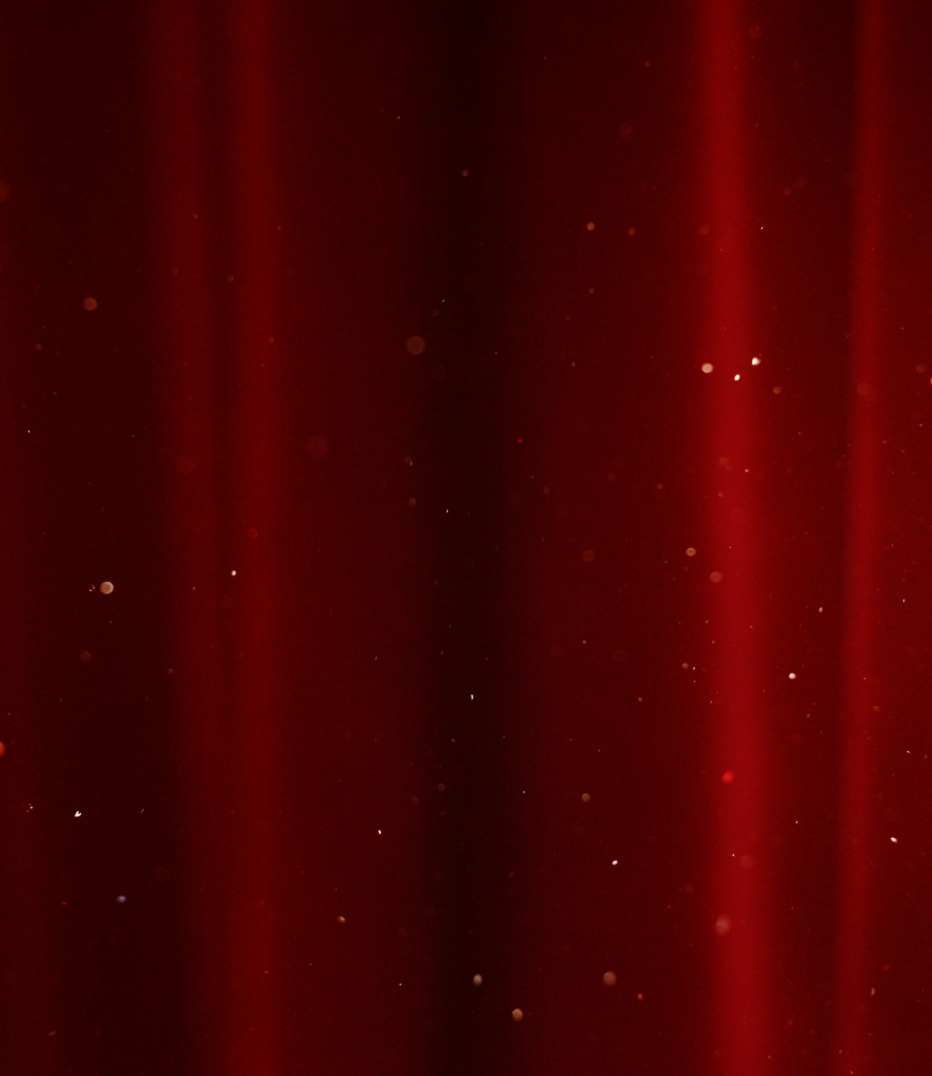3000x3463 Red velvet curtains with floating golden particles