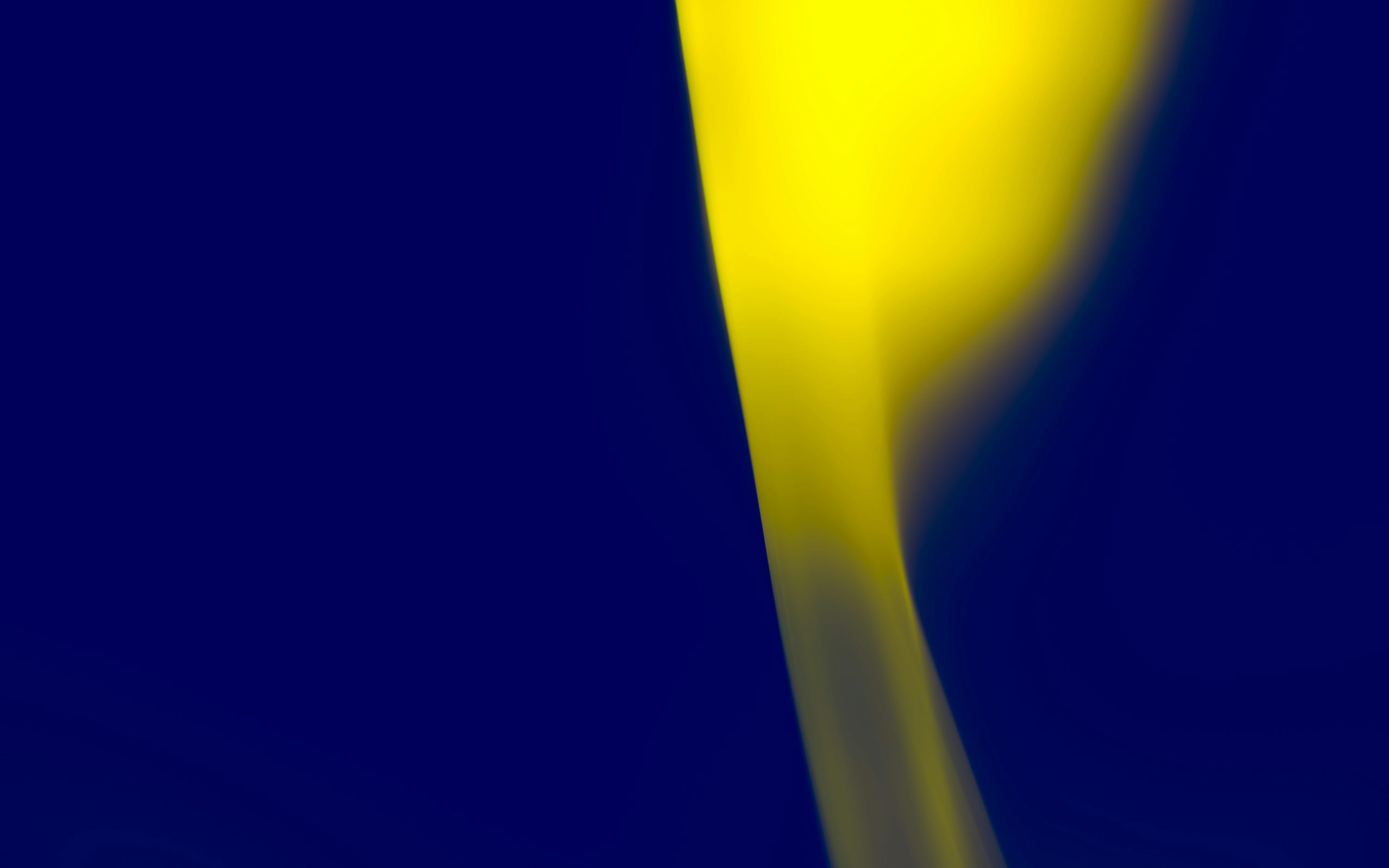 3000x1875 A blurry photo of a yellow object on a blue background