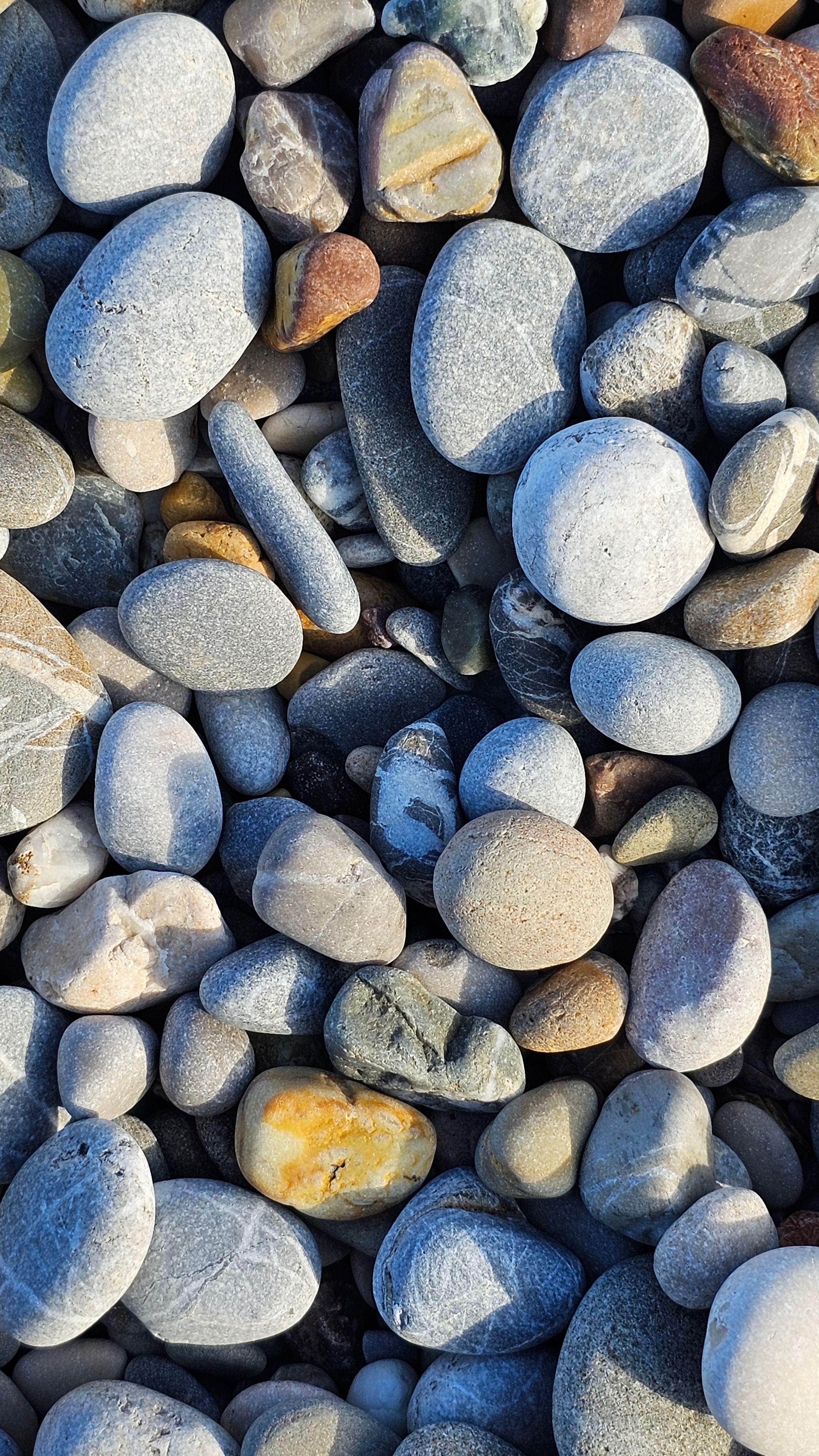 2252x4000 Close Up Of Smooth River Stones Texture · Free