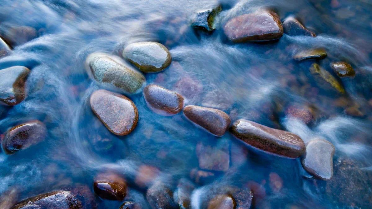 1200x675 How to Place River Stones Around a Pond Landscape