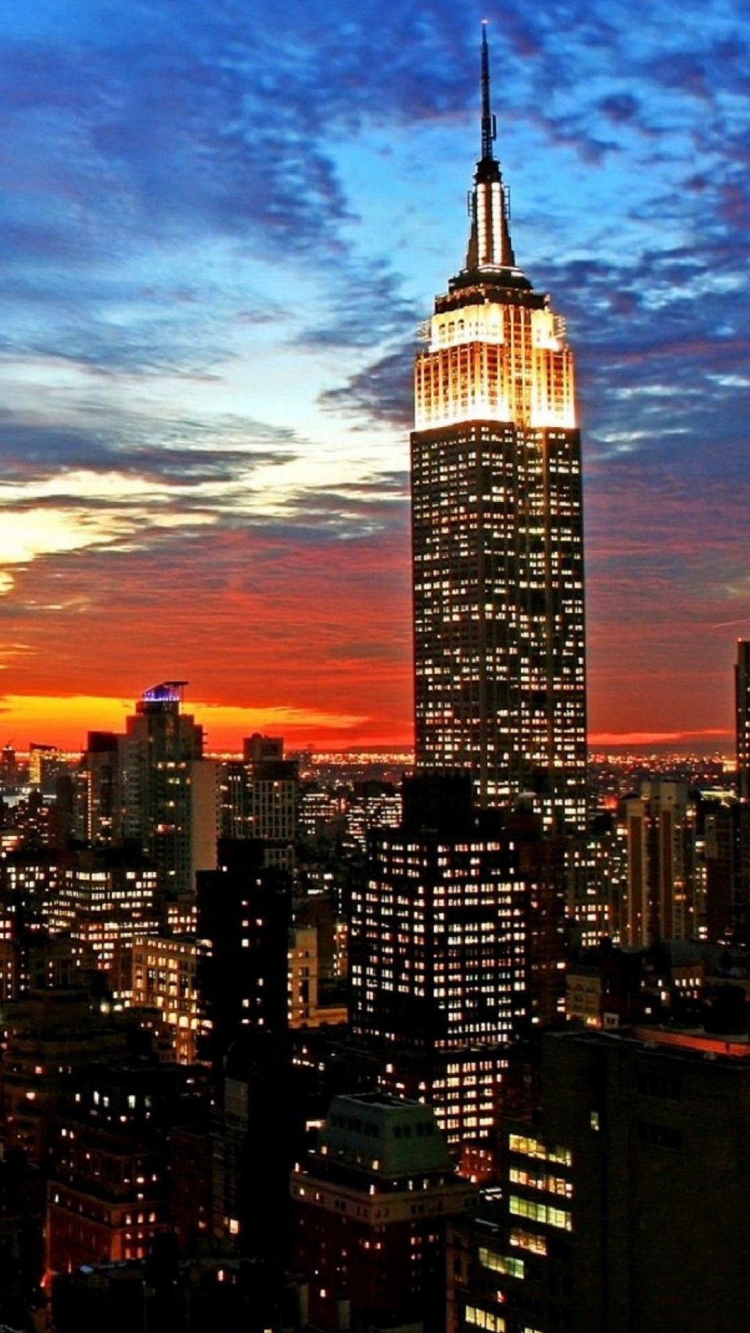 1080x1920 City Manhattan With Background Of Blue And Yellow Sky During Sunset 4K HD New York Wallpaper