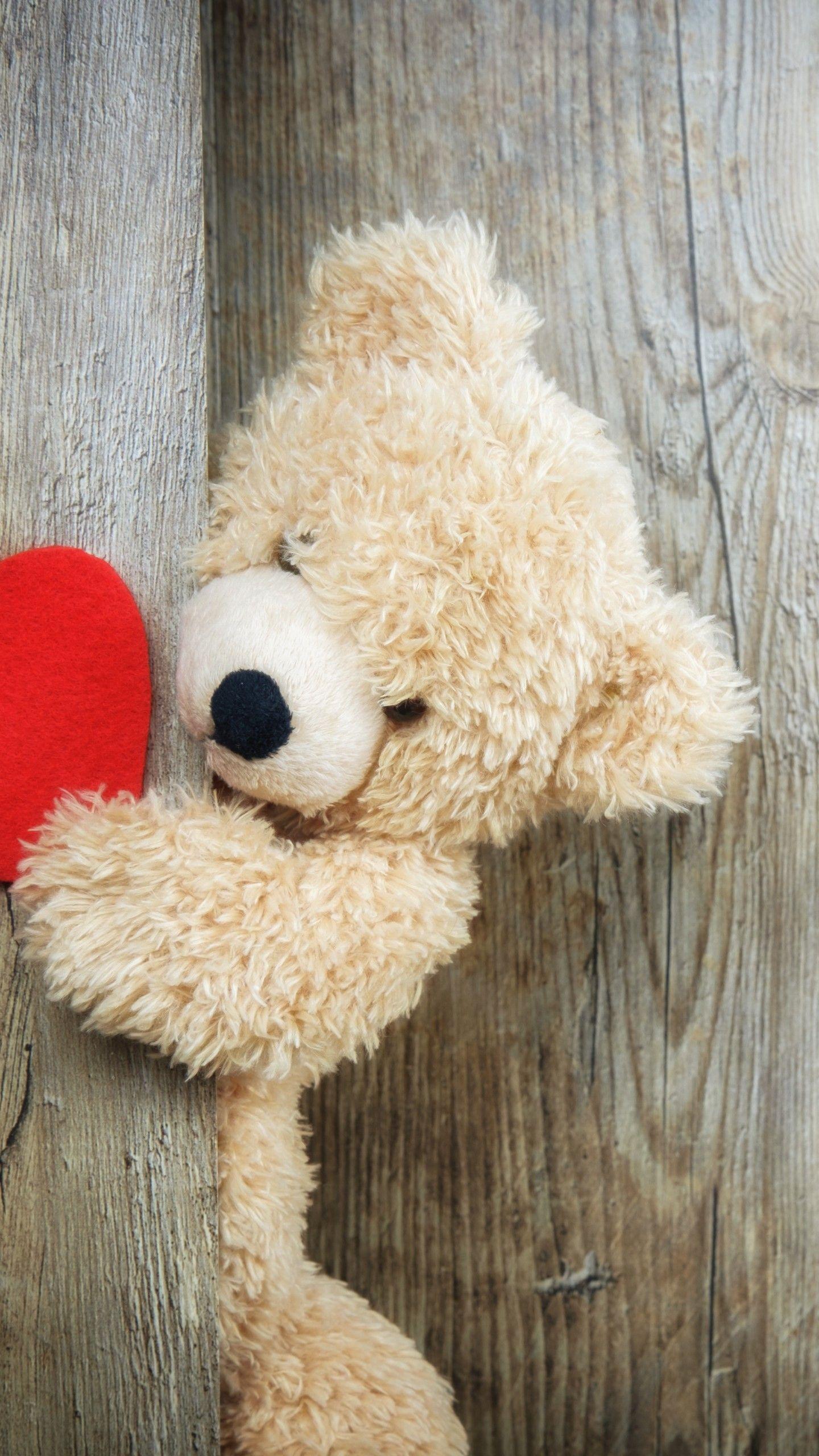 1440x2560 Teddy bear 4K Wallpaper, Red heart, Wooden background, Soft toy, Stuffed, Valentine's Day, Cute