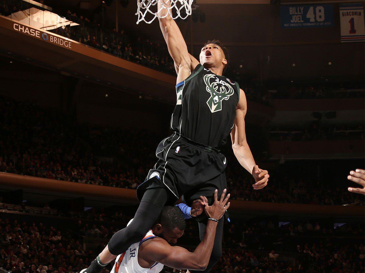 1280x960 Watch: Milwaukee Bucks' Giannis Antetokounmpo Leaps Over New York Knicks' Tim Hardaway Jr
