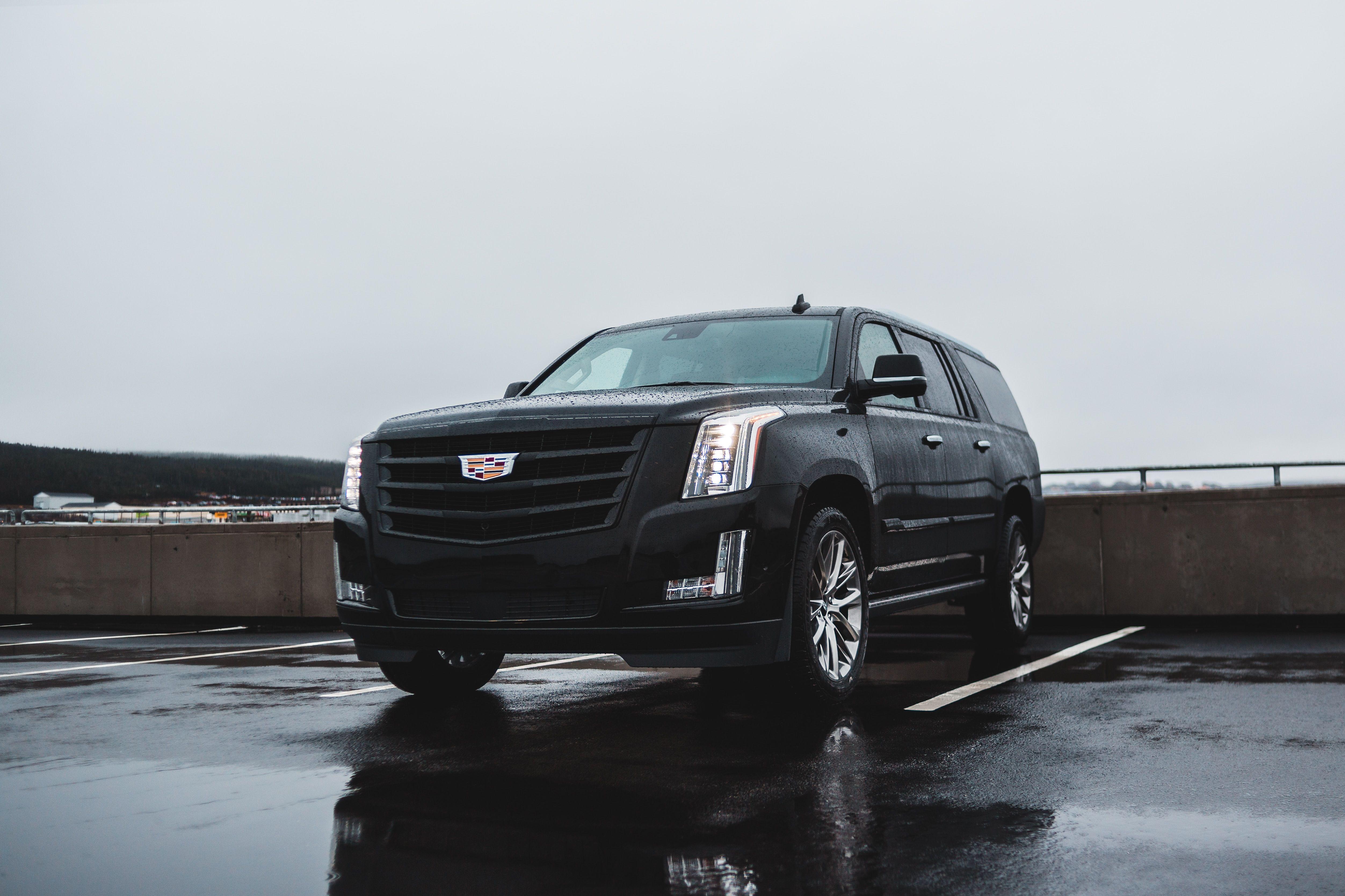 5009x3339 Download wallpaper 5009x3339 cadillac escalade, cadillac, car, suv, black, wet HD background