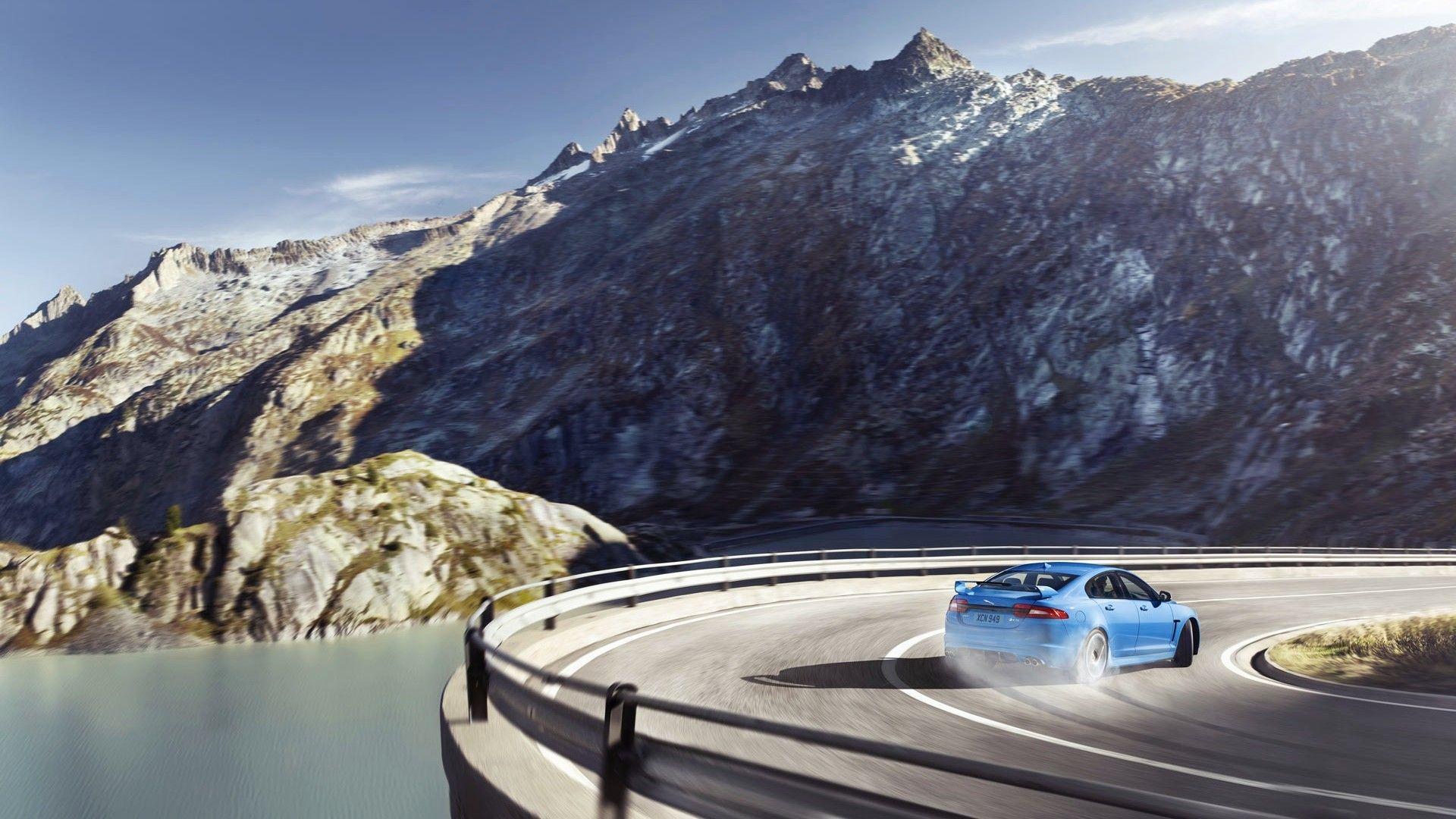 1920x1080 Drift Mountains Car Landscape Vehicle Road Jaguar Wallpaper:1920x1080