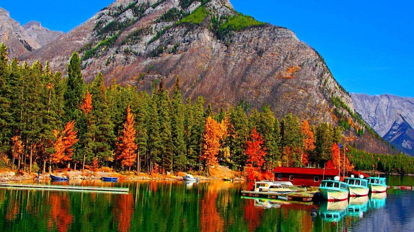 1366x768 Fall Colors On Lake Banff In Canada Boats HD Wallpaper 86053 :