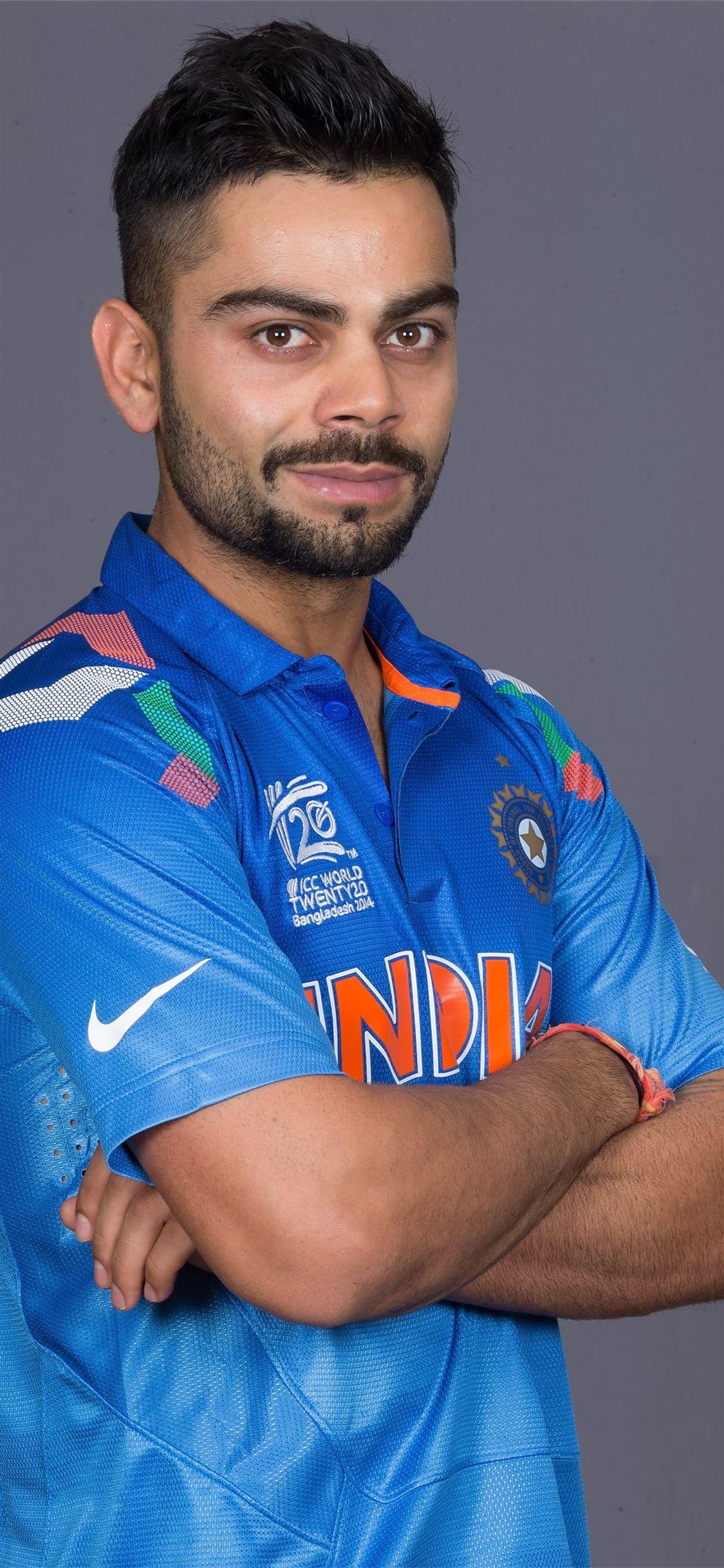 1125x2436 Virat Kohli IMDb iPhone 11 Wallpaper Free Download