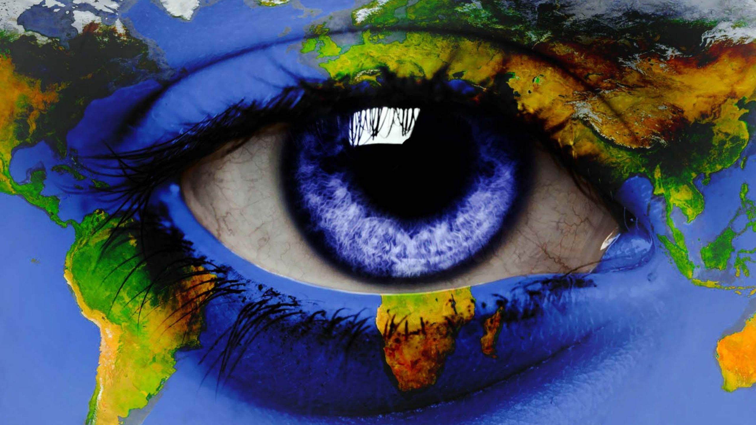 2560x1440 World Map Around An Eye and Abstract Wallpaper. All is Wall