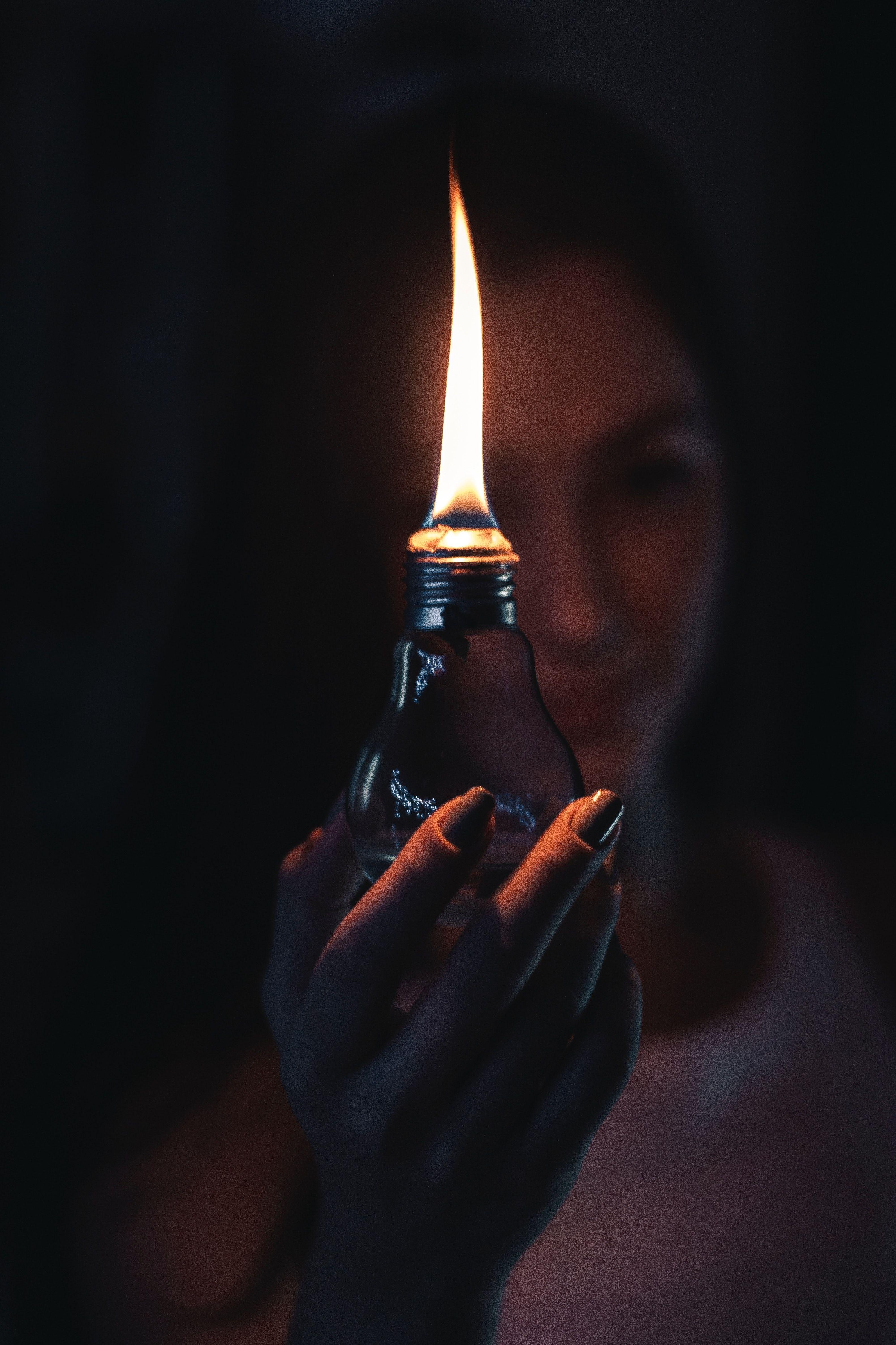 3168x4752 Woman Holding Lighted Oil Lamp · Free