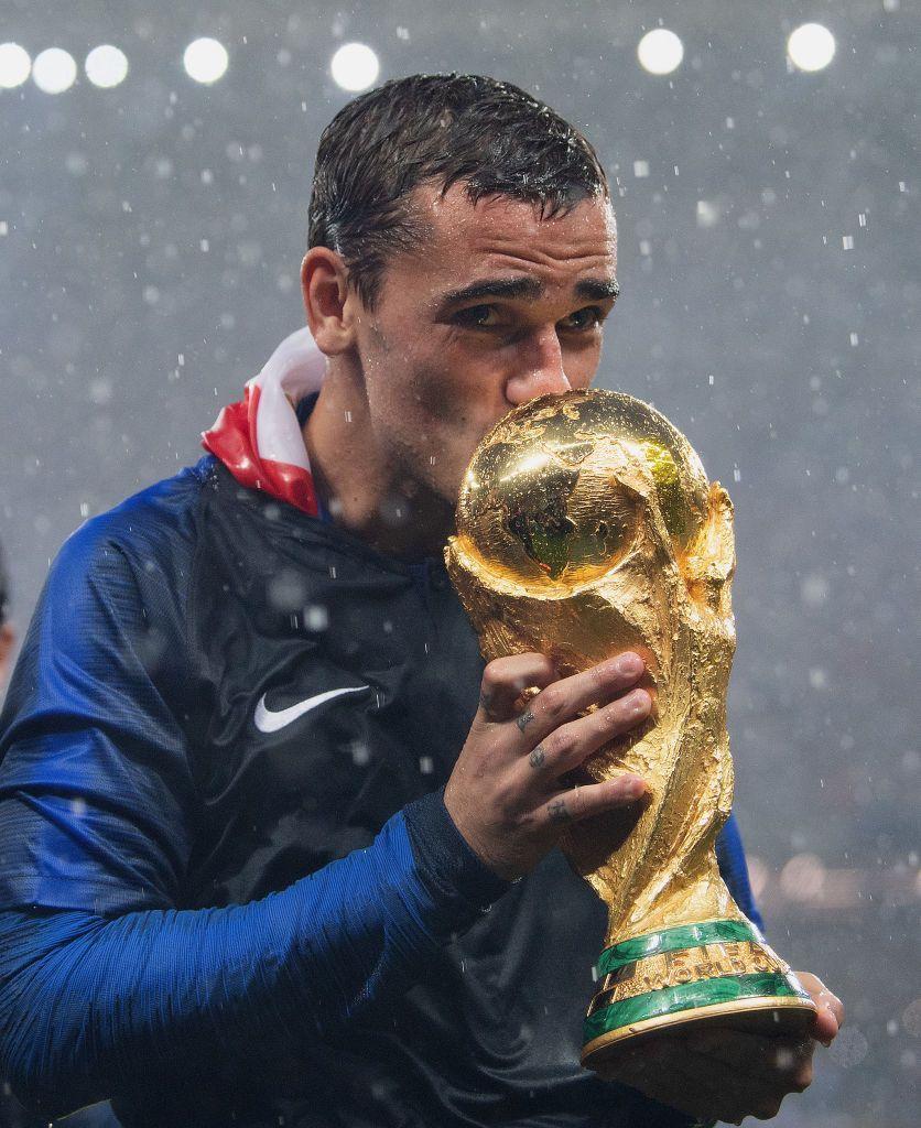 836x1024 Antoine Griezmann of France celebrates with the World Cup Trophy. Antoine griezmann, World cup trophy, Griezmann
