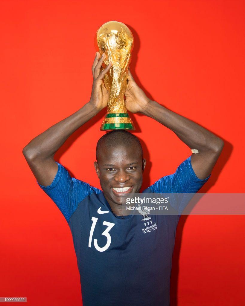 819x1024 N'Golo Kante of France poses with the Champions World Cup trophy after the 2018 FIFA World Cup Russia Final be. World cup champions, Sports celebrities, World cup