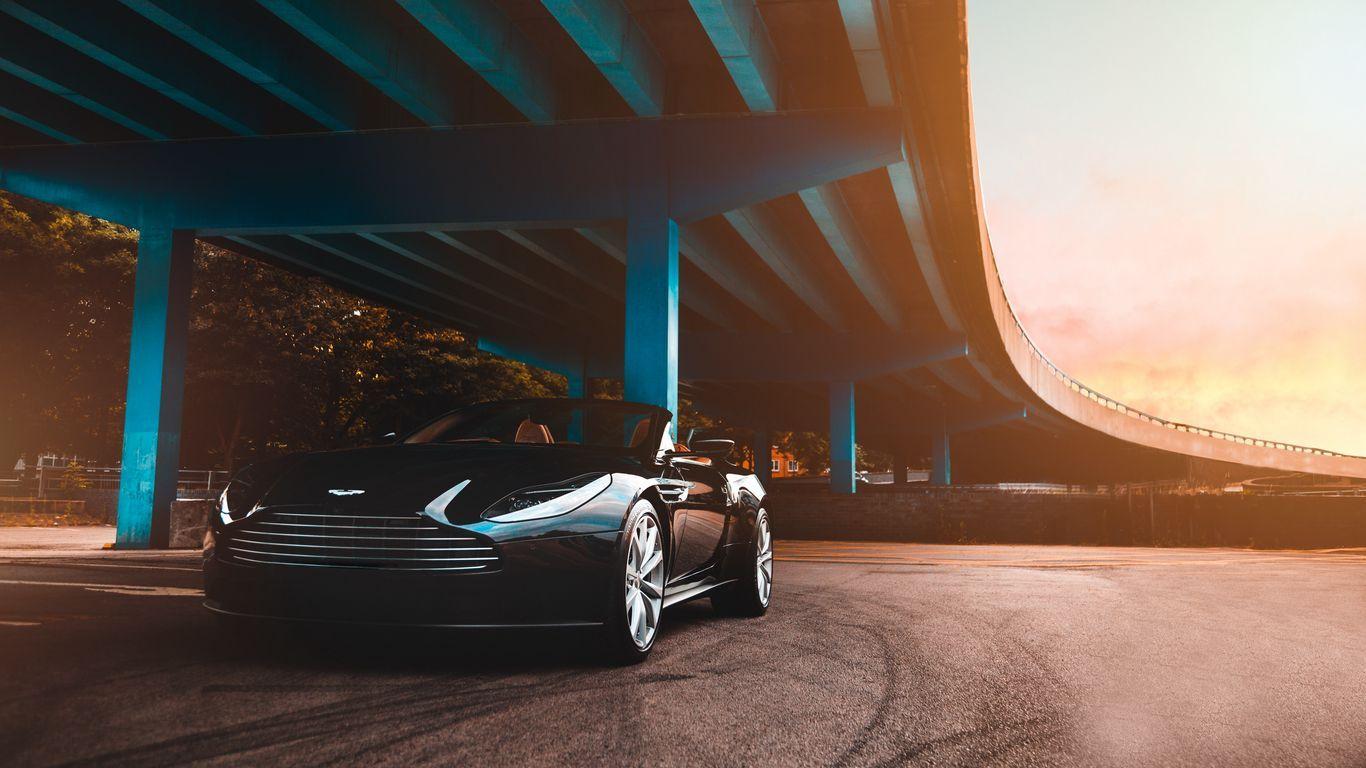 1366x768 Download wallpaper 1366x768 aston martin, car, luxury, bridge tablet, laptop HD background