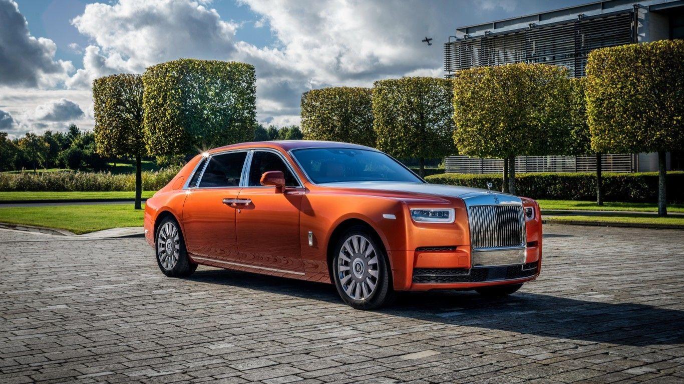 1366x768 Download 1366x768 Rolls Royce Phantom, Orange, Side View, Luxury, Cars Wallpaper for Laptop, Notebook