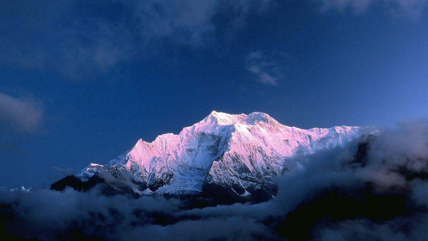 1366x768 Download wallpaper 1366x768 himalayas, nepal, mountains, top, clouds, snow tablet, laptop HD background