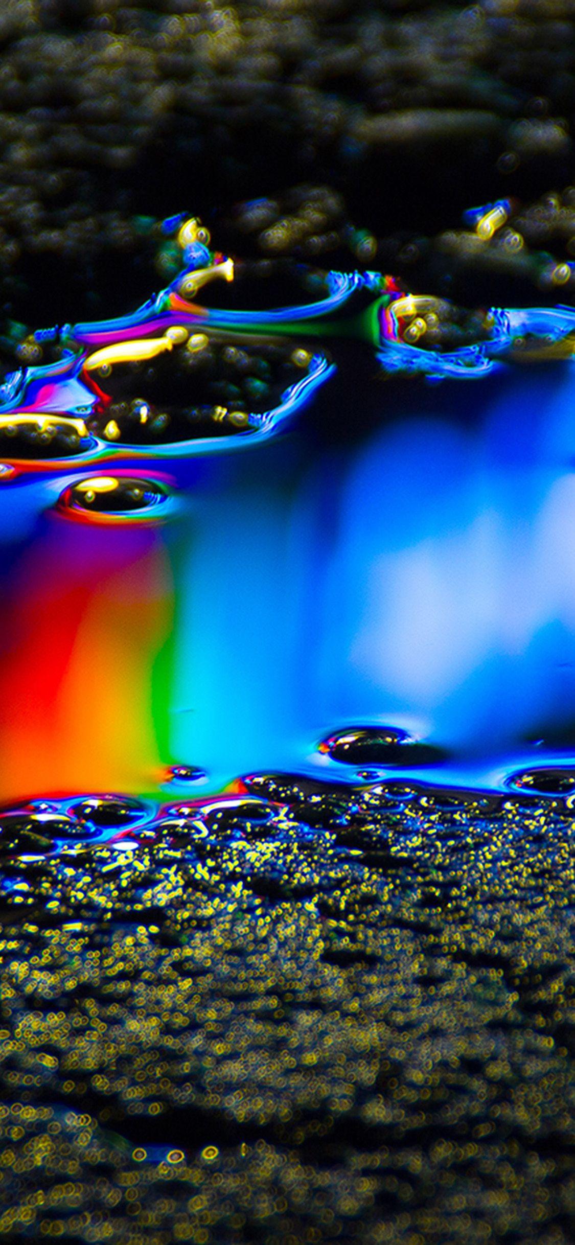 1125x2436 iPhone X wallpaper. oil dark floor rainbow color blue pattern background