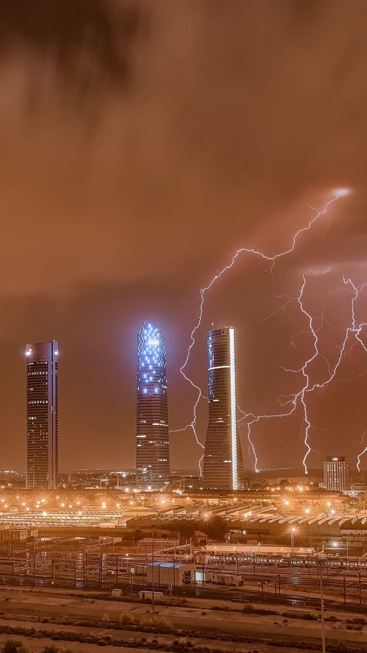 750x1334 Download Lightning, Madrid, city, storm wallpaper, 750x iphone iPhone 8