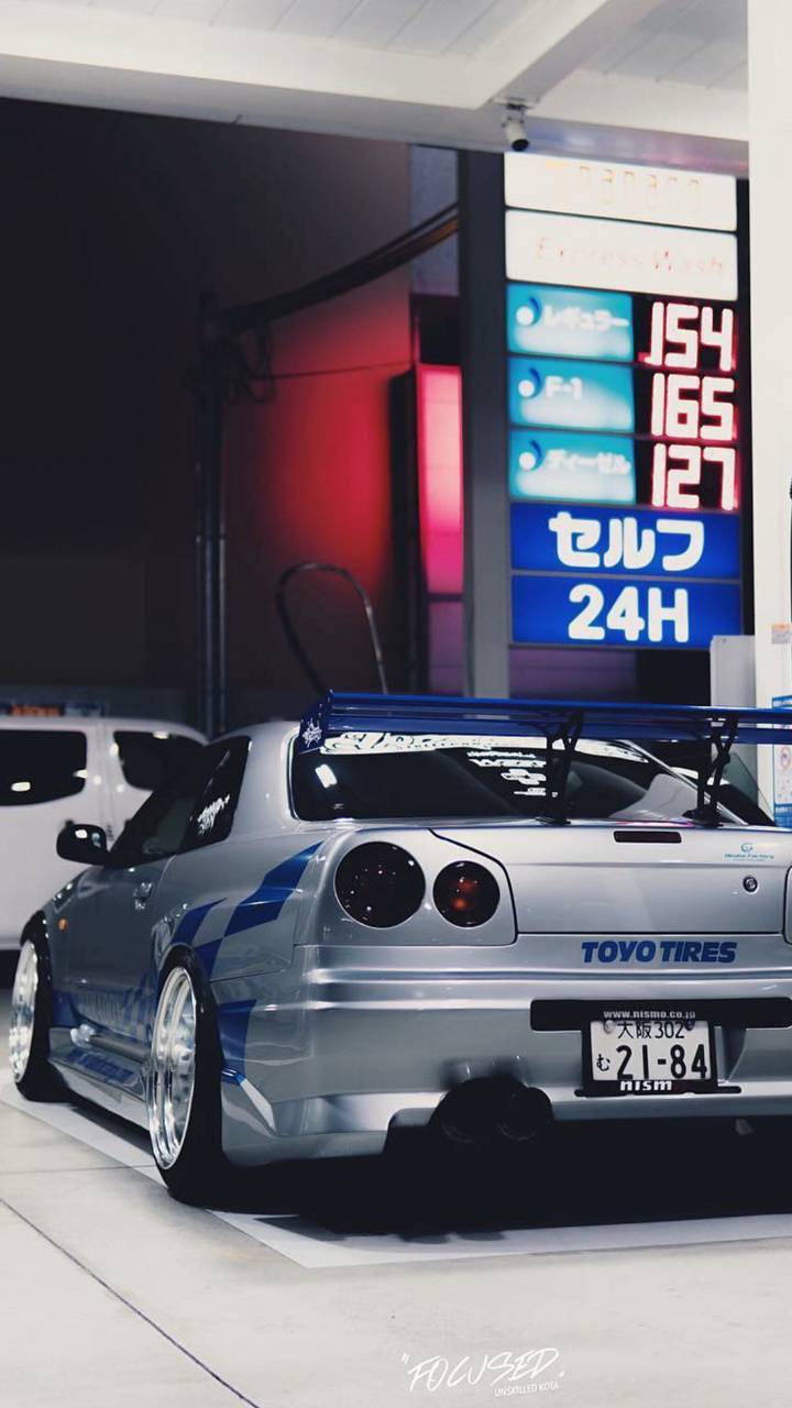 720x1280 Paul Walker Skyline R34 Wallpaper