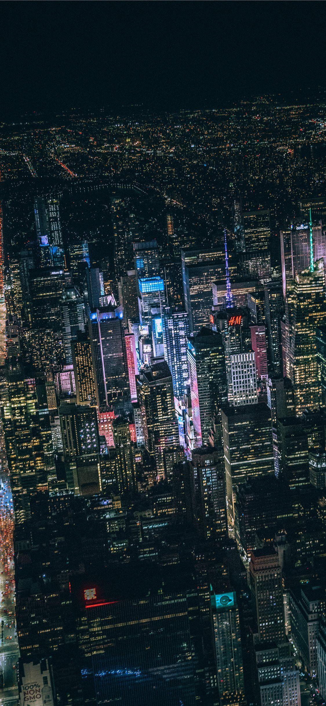 1125x2436 aerial view of city buildings during night time iPhone X Wallpaper Free Download