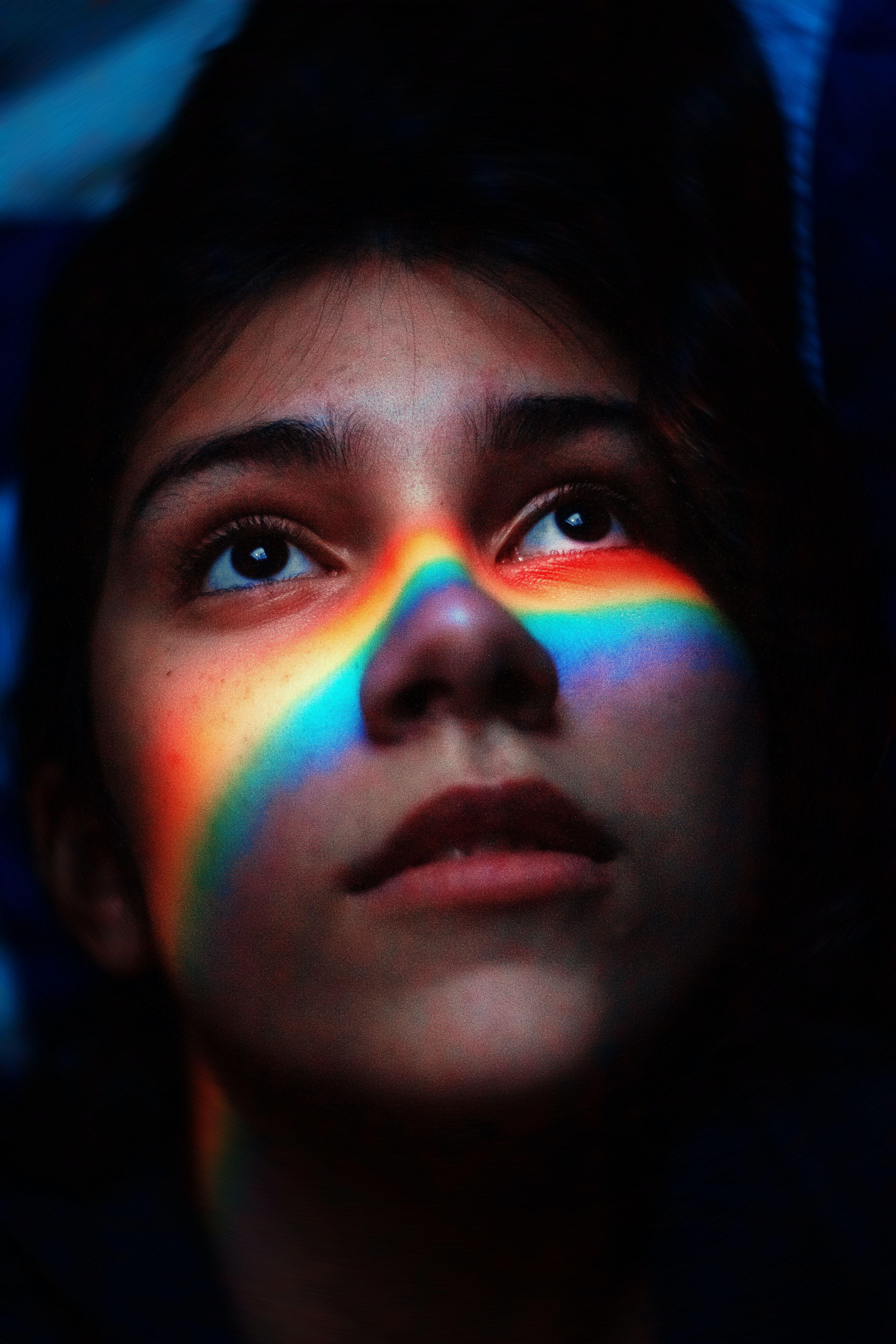 3456x5184 Woman With Rainbow Light Reflecting Her Face · Free