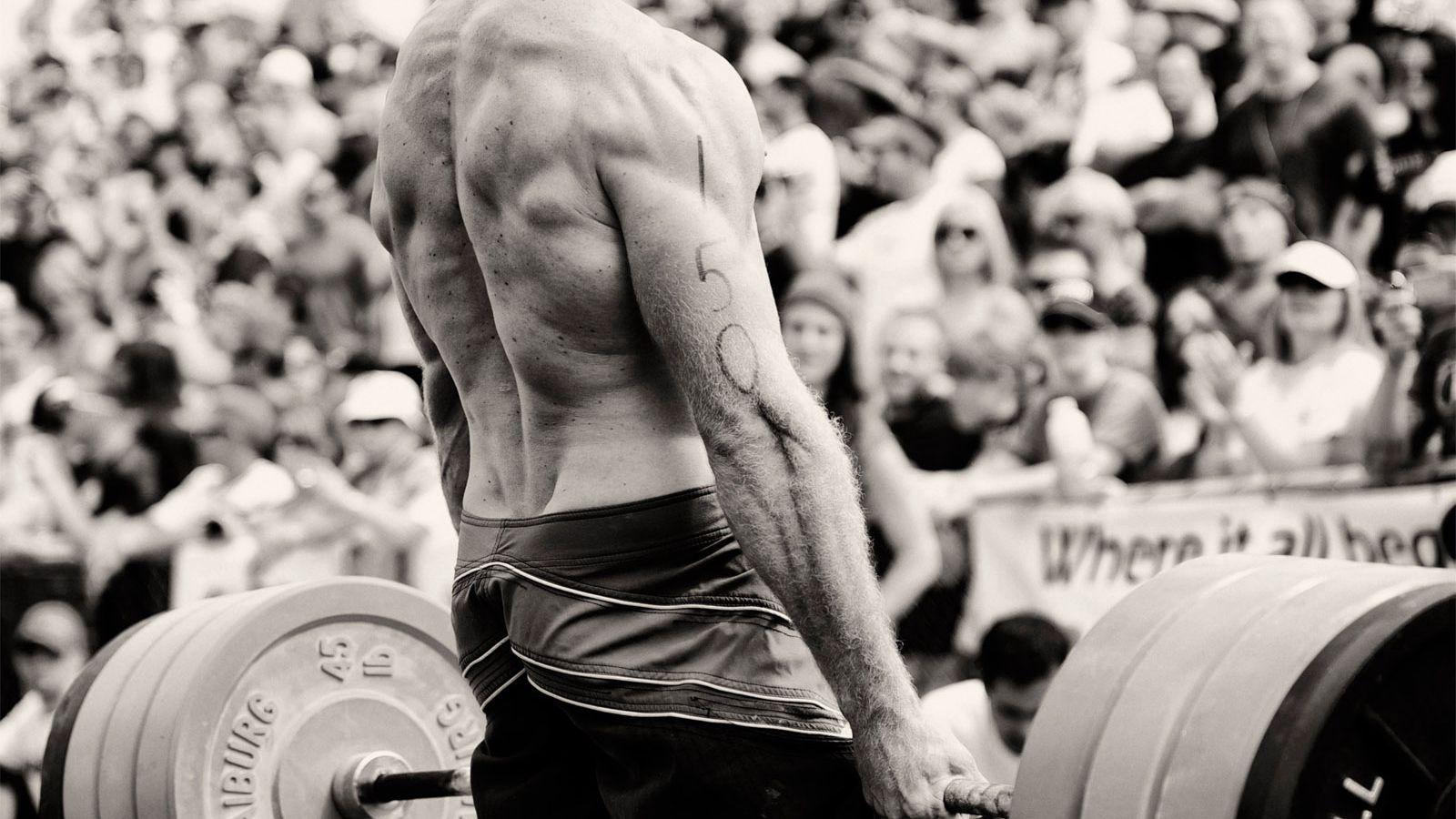 1600x900 Download wallpaper 1600x900 weightlifting, back, sportsman, weight, bar, muscles widescreen 16:9 HD background
