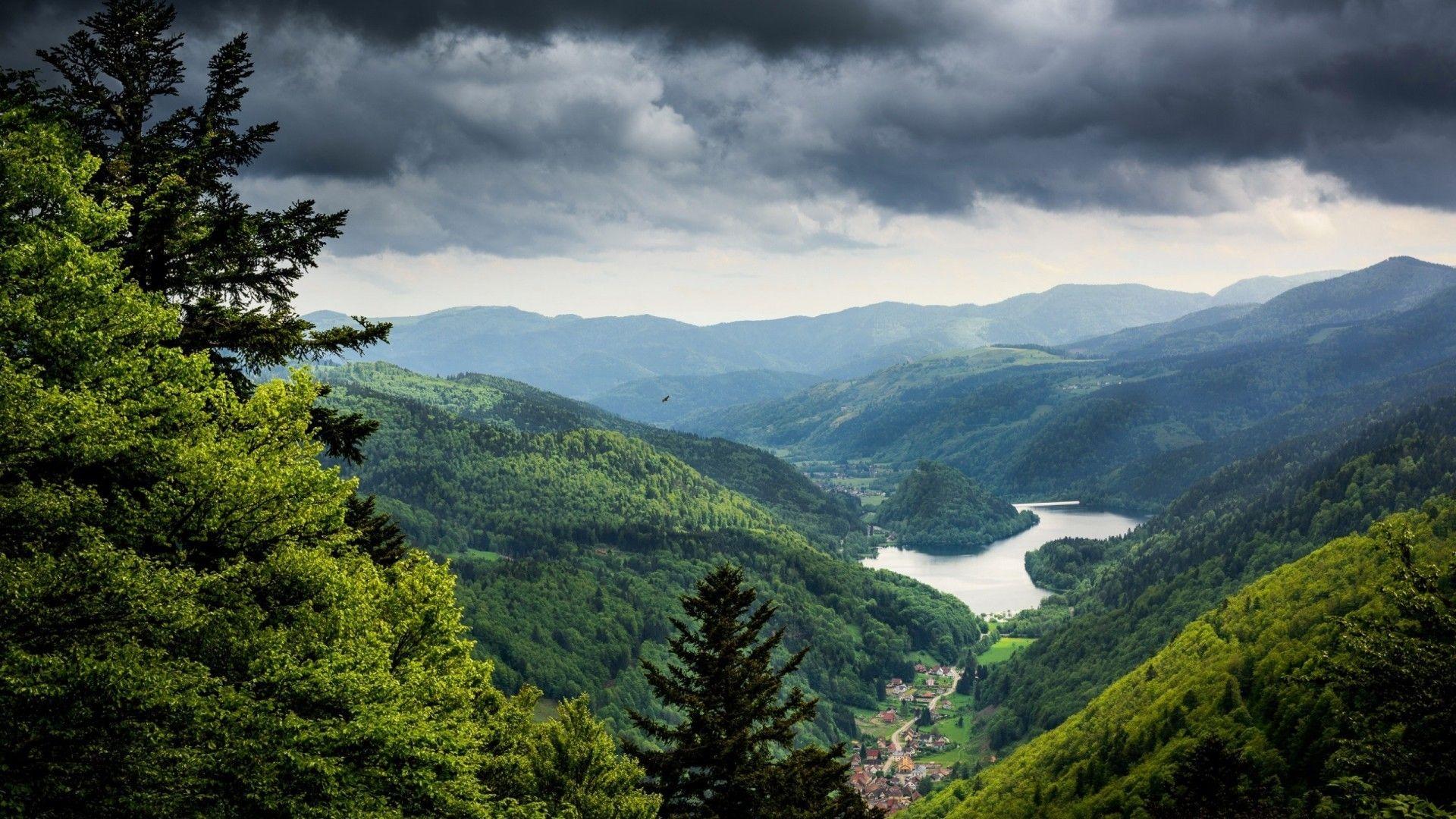 1920x1080 Download 1920x1080 Mountains, River, Dark Weather, Village, Trees Wallpaper for Widescreen