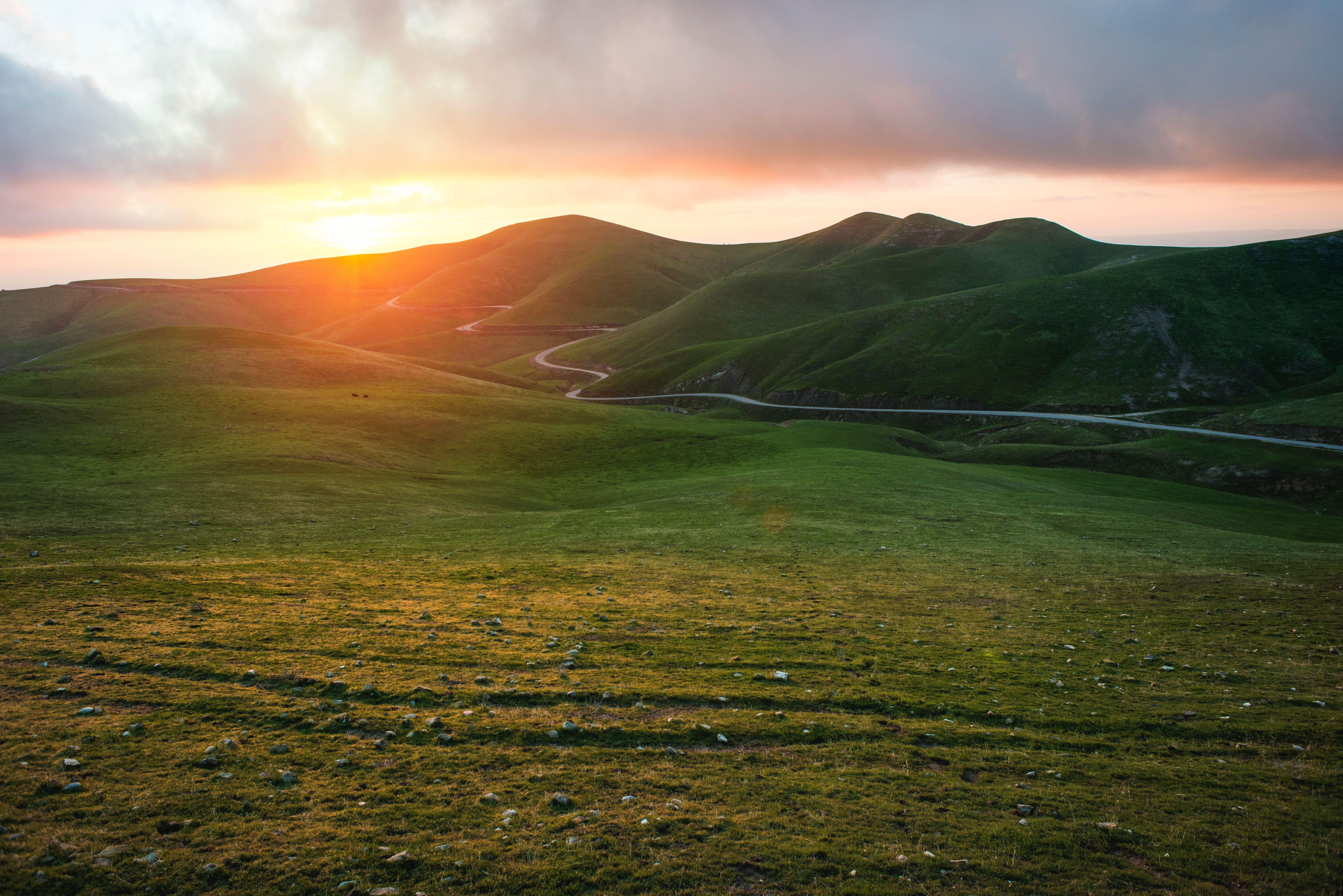 7360x4912 Download wallpaper 7360x4912 valley, grass, sunset, path HD background