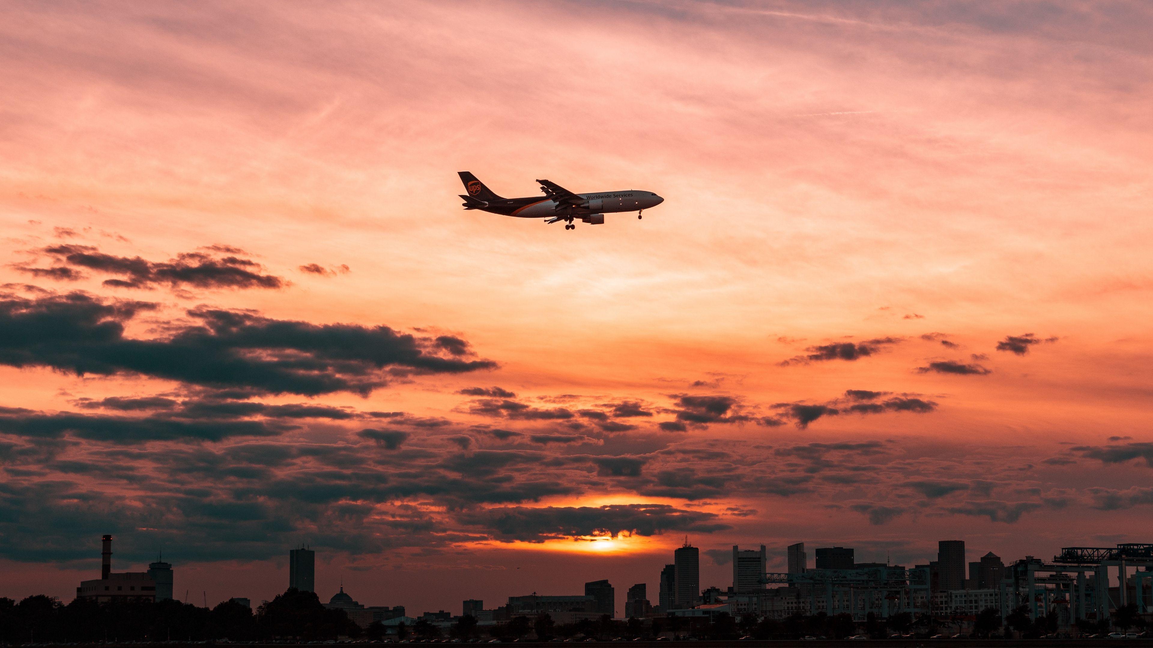 3840x2160 Wallpaper 4k airplane, sky, flight, clouds, sunset 4k Airplane, Flight, Sky