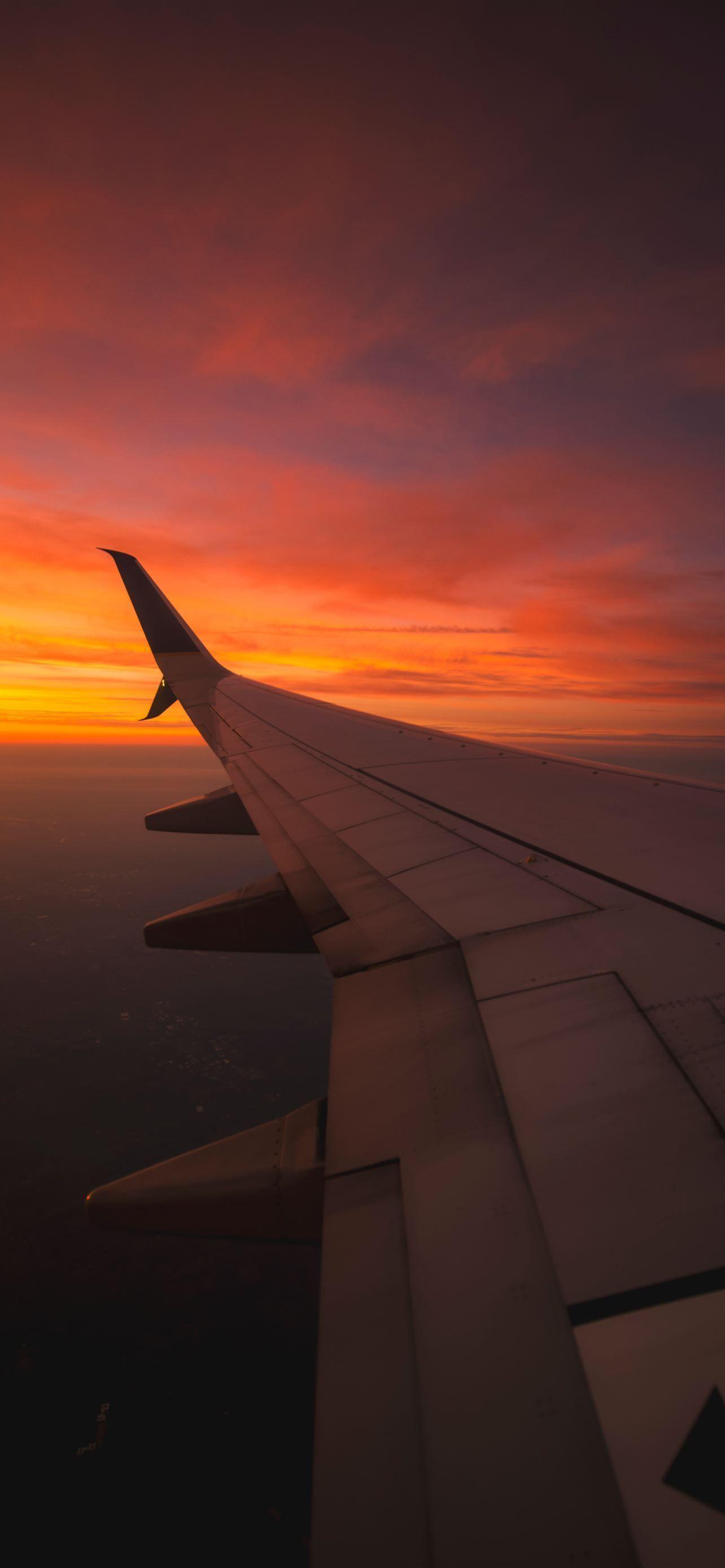 1284x2778 Sunset View From the Window of an Airplane iPhone Wallpaper Free Download